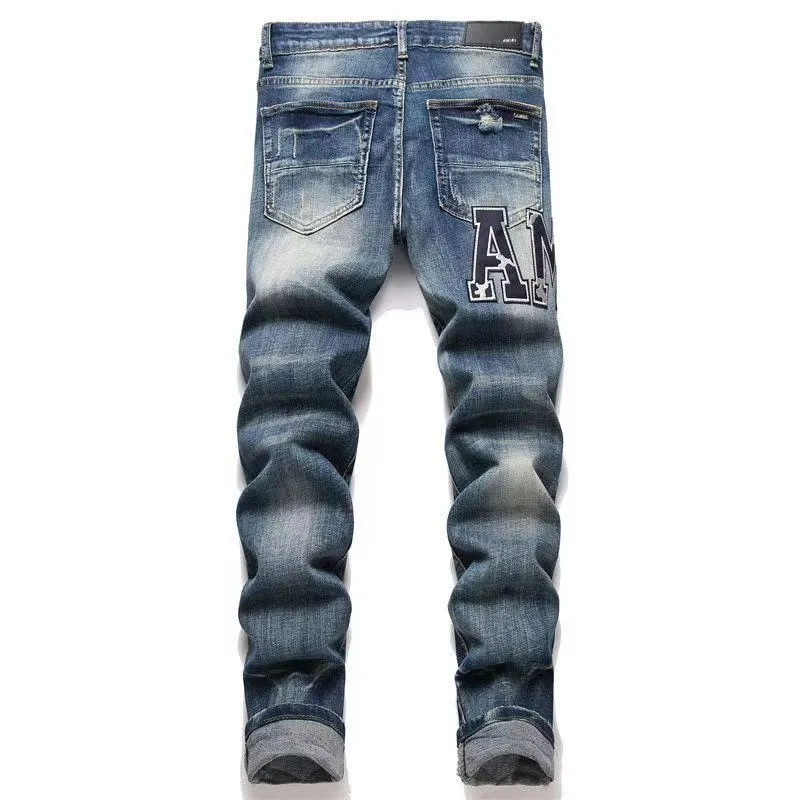 #M42 P168💰 Amiri classic embroidered patched leather distressed lettered jeans. Slim fit jeans. Produced by a major washed factory. Full of high-end. Partial destruction of the knees and patchwork design. Already used as a facade design. Leather waist nameplate. The focus of this style is not on the washing, but on the destroyed shape and version. The secret lies in the craftsmanship of the master. The cost of post-processing, grinding, cutting, etc. is far beyond the cost of assembly line products. Color: Picture color Size: 30-32-34-36