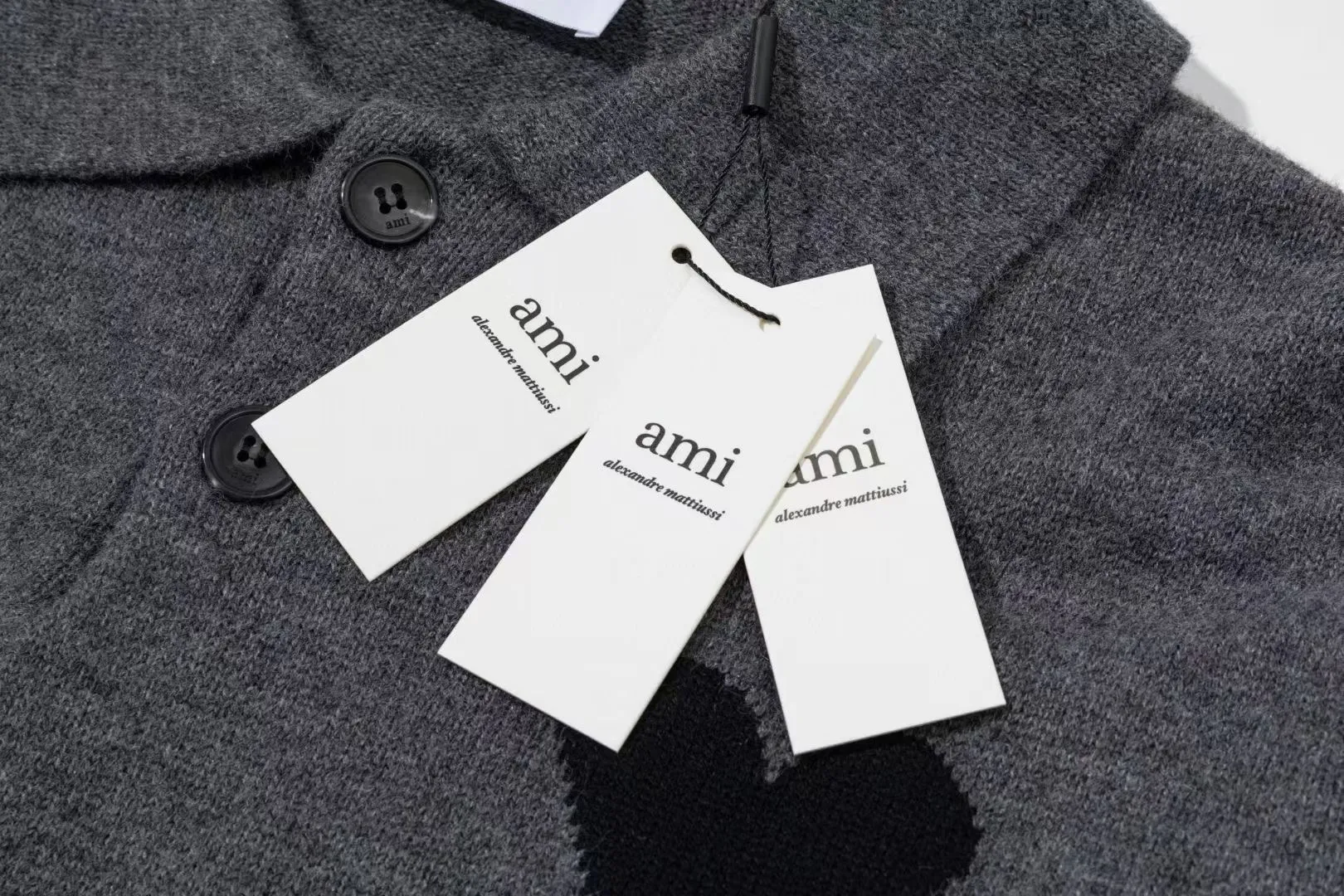 8199# Ami Paris2025 [New arrival in autumn and winter] Black love jacquard ADC Merino Polo collar pullover sweater, the whole body uses reverse bone stitching technology, the same oversize version for men and women, color: white apricot, dark gray, green khaki, size S-XL