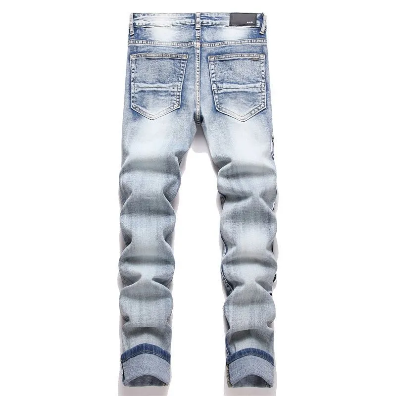 #M45 P168💰 Amiri classic embroidered patched leather distressed lettered jeans. Slim fit jeans. Produced by a major washed factory. Full of high-end. Partial destruction of the knees and patchwork design. Already used as a facade design. Leather waist nameplate. The focus of this style is not on the washing, but on the destroyed shape and version. The secret lies in the craftsmanship of the master. The cost of post-processing, grinding, cutting, etc. is far beyond the cost of assembly line products. Color: Picture color Size: 30-32-34-36