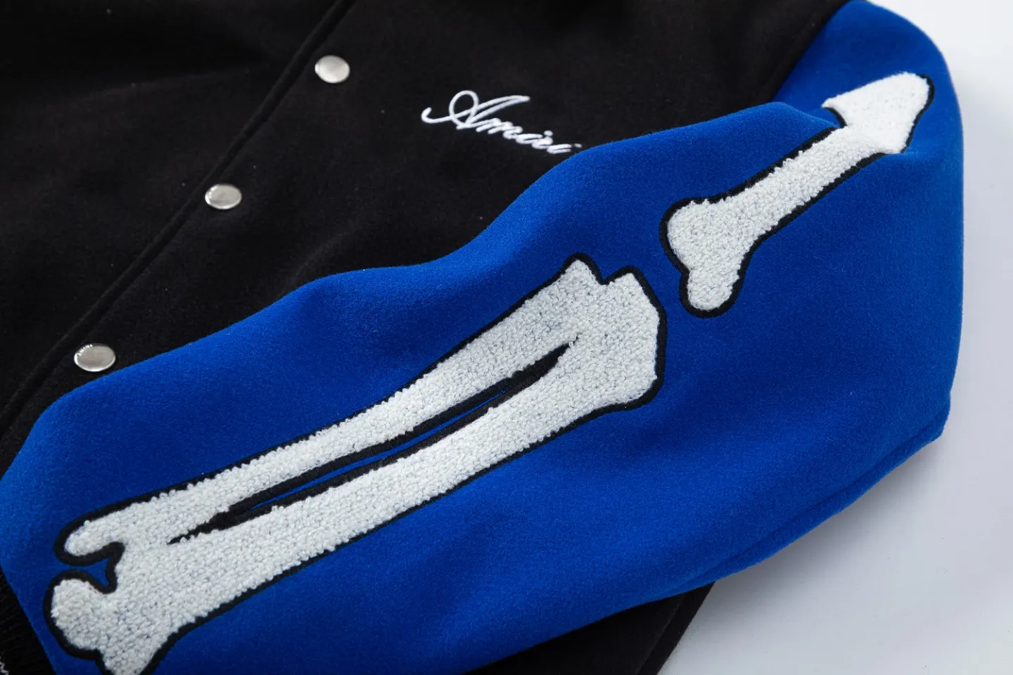 7033#P410Amiri autumn and winter 22SS bone towel embroidered jacket small fragrance American casual baseball uniform trendy jacket for men. Color: black and white, black and blue. Size: S M L XL