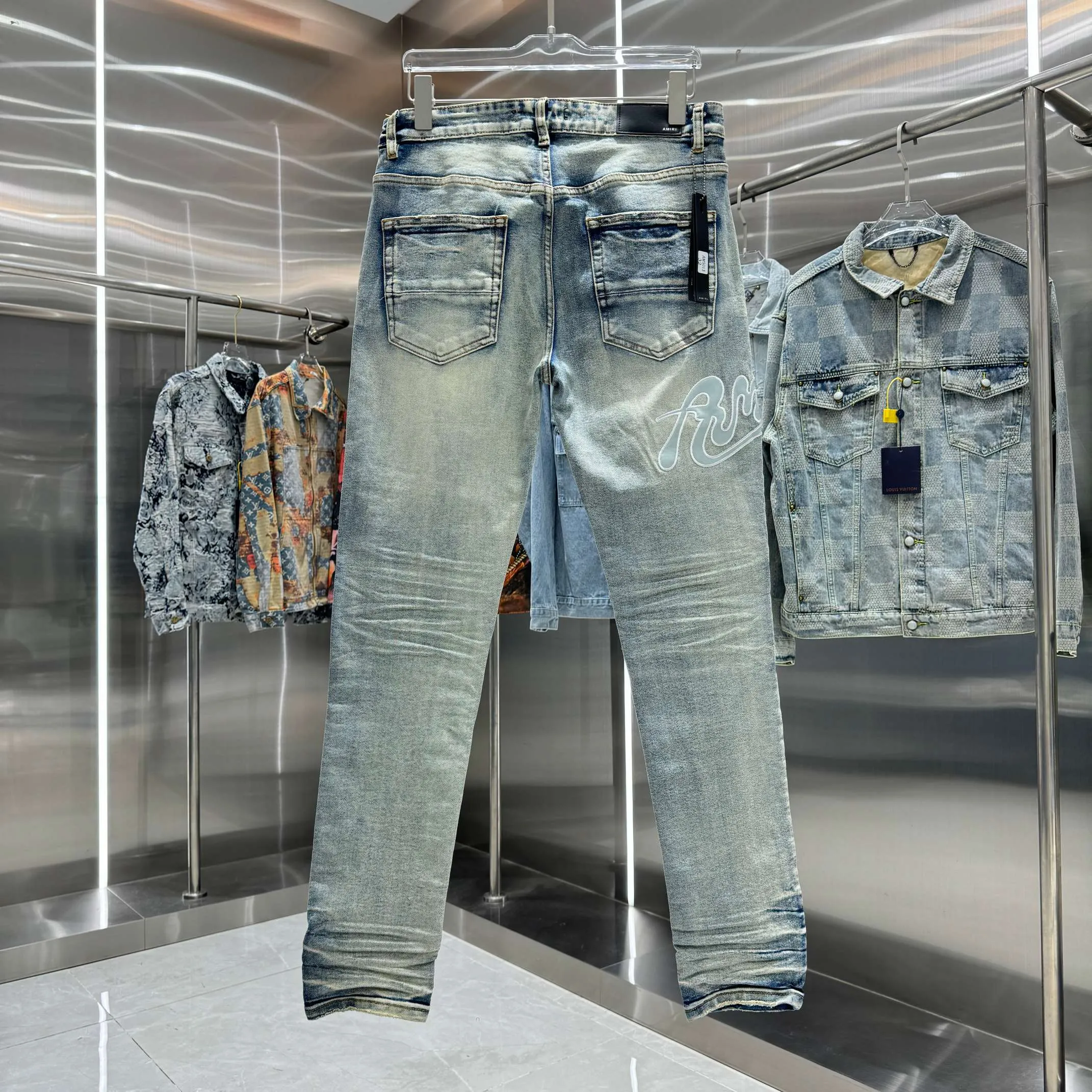 P290 Amiri ripped letter embroidered street fashion slim fit stretch jeans Color light blue Size 30 32 34 36 38