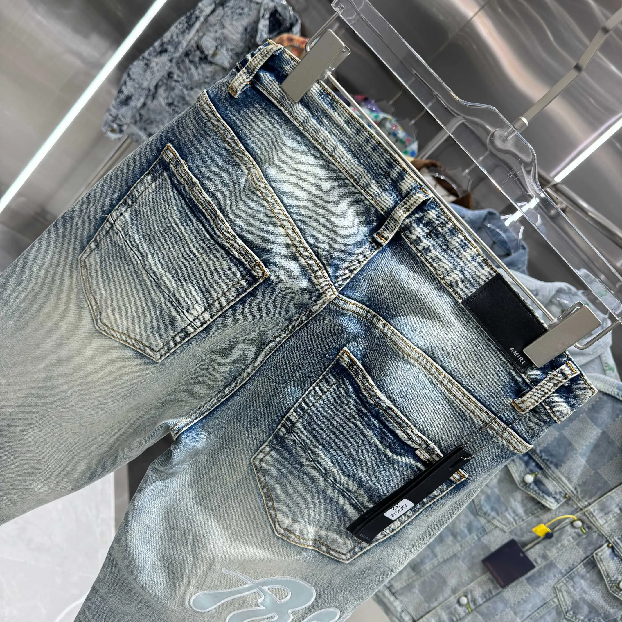 P290 Amiri ripped letter embroidered street fashion slim fit stretch jeans Color light blue Size 30 32 34 36 38
