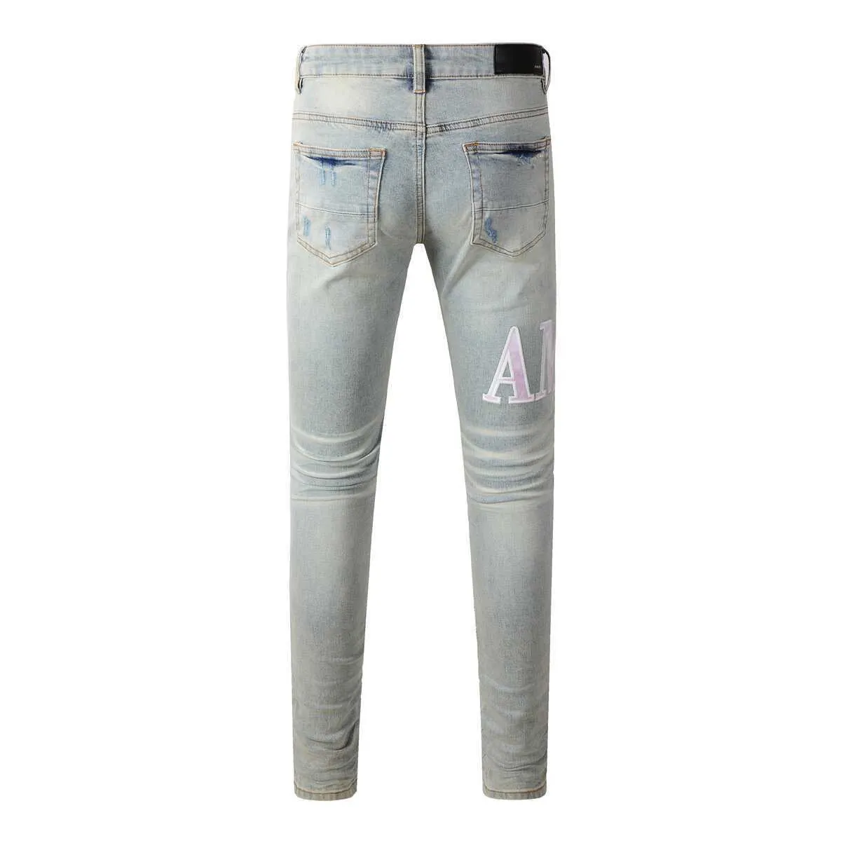 P220 💰 AMIRI patch embroidery jeans trousers AMIRI high street basic ripped tight elastic jeans trousers amiri brand jeans break the production process and cutting of the original jeans, the fabrics are softer and more comfortable Hand-sewn collar label Customized logo buttons Genuine leather tag Color: Picture color Size: 30-32-34-36