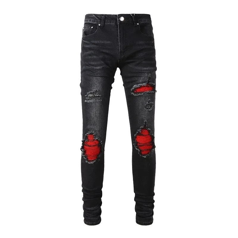 P180 Top replica AMIRI patch embroidered jeans trousers AMIRI high street basic ripped tight stretch jeans trousers Amiriamiri is transliterated as Emil, which is the name of the founder. Mike Amiri, the founder of amiri, grew up in Los Angeles, USA. He was influenced by the local street culture Rock since childhood, so he founded the amiri brand named after himself. A variety of trendy clothing meets the needs of different fashion players. Amiri clothing has novel and unique styles and is a well-known street brand in the United States. Many of its styles and styles are loved by many street photographers. Various clothing styles meet the needs of different people, show their unique temperament, and show the trend of dressing. amiri's jeans are relatively famous. Not only do they have many styles, but the quality of the jeans is also very good. Many celebrities have also worn amiri brand jeans.  The jeans of the amiri brand break through the production process and cutting of the original jeans. The fabrics are relatively soft and comfortable, and are not as hard as some jeans, which can irritate the skin and cause the skin to bleed when worn. Los Angeles trendy brand Amiri's jeans are made with great detail from tailoring to texture, adding wrinkles, bullet holes, damage and other details to add to the trendiness of the jeans. You can choose the style that suits you according to your own needs. Only when you wear a suitable style can you have a certain sense of fashion.  In recent years, high street has become a word that appears more and more frequently in men's clothing. High street style has also become an important direction for everyone's matching. High street related items are basically inseparable from oversize or off-shoulder tops. The lower body is matched with trackpants or tight-fitting denim. In my opinion, the most representative one is perhaps annihilation. Color; picture color Size: m l xl xxl