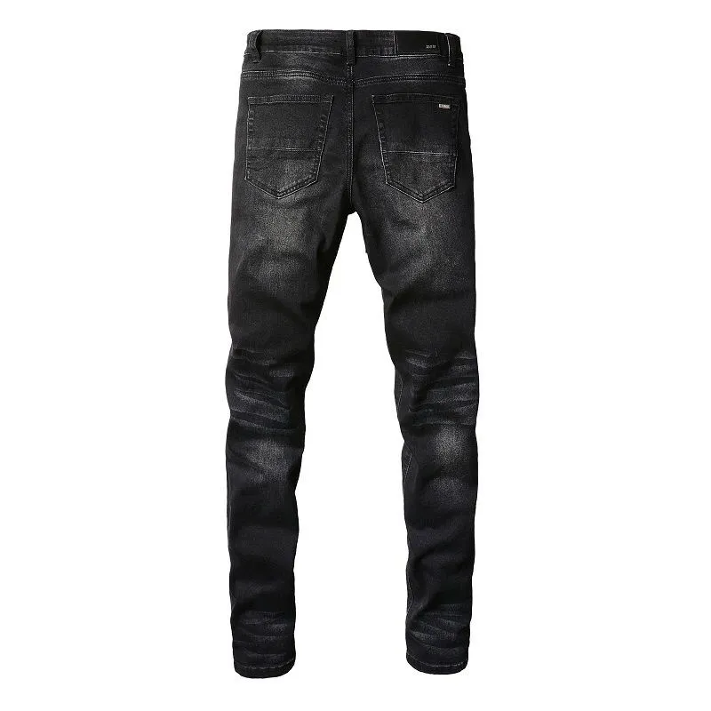 P180 Top replica AMIRI patch embroidered jeans trousers AMIRI high street basic ripped tight stretch jeans trousers Amiriamiri is transliterated as Emil, which is the name of the founder. Mike Amiri, the founder of amiri, grew up in Los Angeles, USA. He was influenced by the local street culture Rock since childhood, so he founded the amiri brand named after himself. A variety of trendy clothing meets the needs of different fashion players. Amiri clothing has novel and unique styles and is a well-known street brand in the United States. Many of its styles and styles are loved by many street photographers. Various clothing styles meet the needs of different people, show their unique temperament, and show the trend of dressing. amiri's jeans are relatively famous. Not only do they have many styles, but the quality of the jeans is also very good. Many celebrities have also worn amiri brand jeans.  The jeans of the amiri brand break through the production process and cutting of the original jeans. The fabrics are relatively soft and comfortable, and are not as hard as some jeans, which can irritate the skin and cause the skin to bleed when worn. Los Angeles trendy brand Amiri's jeans are made with great detail from tailoring to texture, adding wrinkles, bullet holes, damage and other details to add to the trendiness of the jeans. You can choose the style that suits you according to your own needs. Only when you wear a suitable style can you have a certain sense of fashion.  In recent years, high street has become a word that appears more and more frequently in men's clothing. High street style has also become an important direction for everyone's matching. High street related items are basically inseparable from oversize or off-shoulder tops. The lower body is matched with trackpants or tight-fitting denim. In my opinion, the most representative one is perhaps annihilation. Color; picture color Size: m l xl xxl