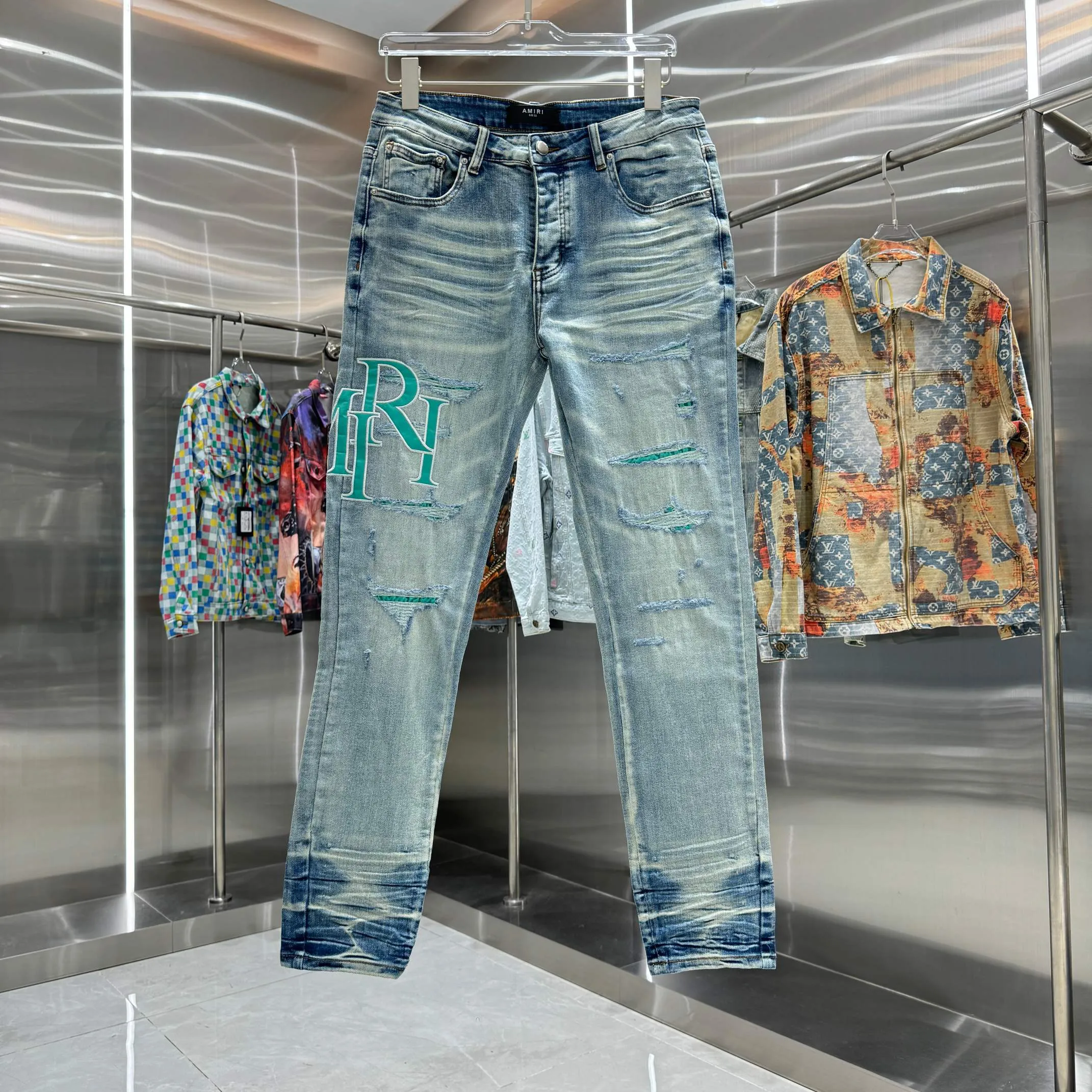 P290 Amiri ripped letter embroidery craft street fashion slim fit stretch jeans color blue size 30 32 34 36 38