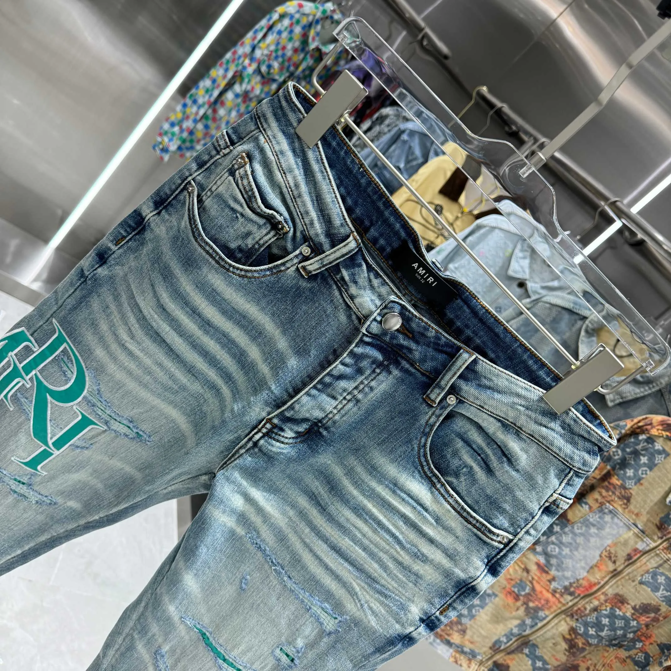 P290 Amiri ripped letter embroidery craft street fashion slim fit stretch jeans color blue size 30 32 34 36 38