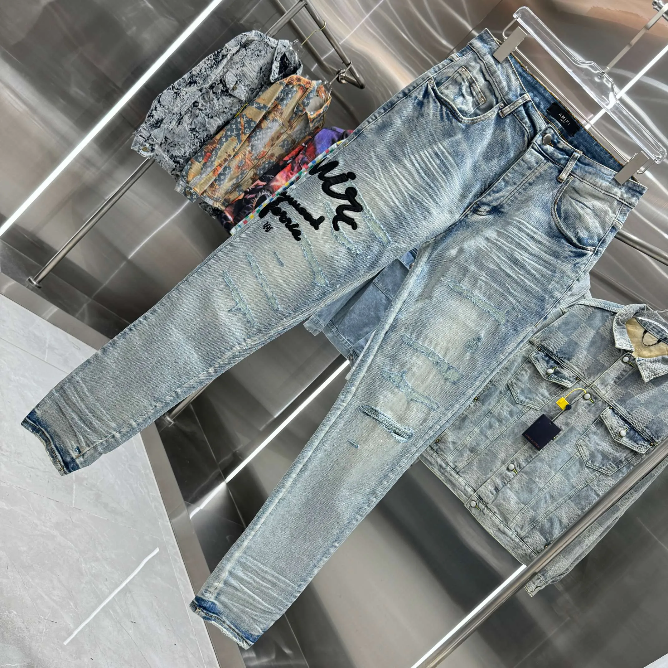 P290 Amiri ripped letter embroidered street fashion slim fit stretch jeans Color light blue Size 30 32 34 36 38