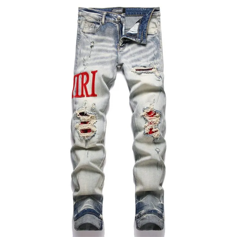 P166 Top replica AMIRI splash-ink medal patch embroidered jeans trousers AMIRI high street basic ripped tight stretch jeans trousers Amiriamiri is transliterated as Emil, which is the name of the founder. Mike Amiri, the founder of amiri, grew up in Los Angeles, USA. He was influenced by the local street culture Rock since childhood, so he founded the amiri brand named after himself. A variety of fashion brand clothing meets the needs of different fashion players. Amiri clothing has novel and unique styles and is a well-known street brand in the United States. Many of its styles and styles are loved by many street photographers. Various clothing styles meet the needs of different people, show their unique temperament, and show the trend of dressing. amiri's jeans are relatively famous. Not only do they have many styles, but the quality of the jeans is also very good. Many celebrities have also worn amiri brand jeans.  The jeans of the amiri brand break through the production process and cutting of the original jeans. The fabrics are relatively soft and comfortable, and are not as hard as some jeans, which can irritate the skin and cause the skin to bleed when worn. Los Angeles trendy brand Amiri's jeans are made with great detail from tailoring to texture, adding wrinkles, bullet holes, damage and other details to add to the trendiness of the jeans. You can choose the style that suits you according to your own needs. Only when you wear a suitable style can you have a certain sense of fashion.  In recent years, high street has become a word that appears more and more frequently in men's clothing. High street style has also become an important direction for everyone's matching. High street related items are basically inseparable from oversize or off-shoulder tops. The lower body is matched with trackpants or tight-fitting denim. In my opinion, the most representative one is perhaps annihilation. Color; picture color Size: m l xl xxl