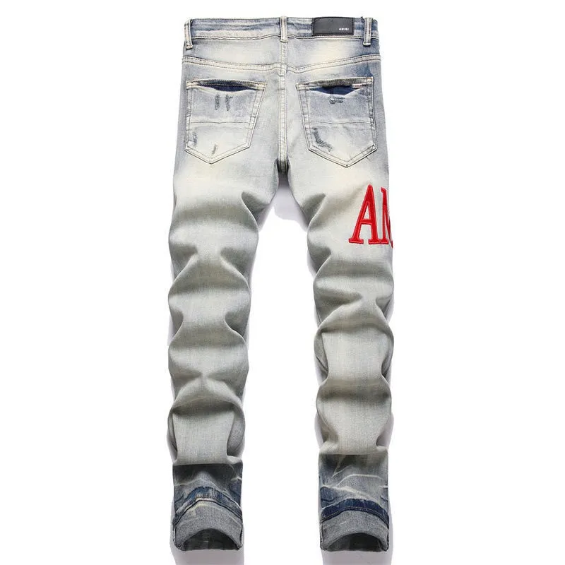 P166 Top replica AMIRI splash-ink medal patch embroidered jeans trousers AMIRI high street basic ripped tight stretch jeans trousers Amiriamiri is transliterated as Emil, which is the name of the founder. Mike Amiri, the founder of amiri, grew up in Los Angeles, USA. He was influenced by the local street culture Rock since childhood, so he founded the amiri brand named after himself. A variety of fashion brand clothing meets the needs of different fashion players. Amiri clothing has novel and unique styles and is a well-known street brand in the United States. Many of its styles and styles are loved by many street photographers. Various clothing styles meet the needs of different people, show their unique temperament, and show the trend of dressing. amiri's jeans are relatively famous. Not only do they have many styles, but the quality of the jeans is also very good. Many celebrities have also worn amiri brand jeans.  The jeans of the amiri brand break through the production process and cutting of the original jeans. The fabrics are relatively soft and comfortable, and are not as hard as some jeans, which can irritate the skin and cause the skin to bleed when worn. Los Angeles trendy brand Amiri's jeans are made with great detail from tailoring to texture, adding wrinkles, bullet holes, damage and other details to add to the trendiness of the jeans. You can choose the style that suits you according to your own needs. Only when you wear a suitable style can you have a certain sense of fashion.  In recent years, high street has become a word that appears more and more frequently in men's clothing. High street style has also become an important direction for everyone's matching. High street related items are basically inseparable from oversize or off-shoulder tops. The lower body is matched with trackpants or tight-fitting denim. In my opinion, the most representative one is perhaps annihilation. Color; picture color Size: m l xl xxl