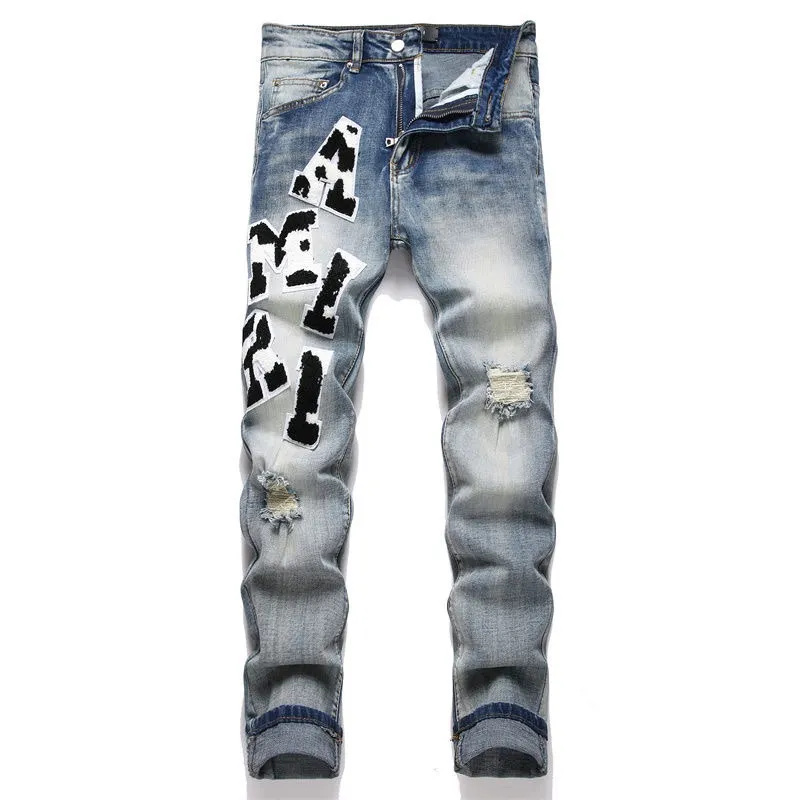 P166 Top replica AMIRI splash-ink medal patch embroidered jeans trousers AMIRI high street basic ripped tight stretch jeans trousers Amiriamiri is transliterated as Emil, which is the name of the founder. Mike Amiri, the founder of amiri, grew up in Los Angeles, USA. He was influenced by the local street culture Rock since childhood, so he founded the amiri brand named after himself. A variety of fashion brand clothing meets the needs of different fashion players. Amiri clothing has novel and unique styles and is a well-known street brand in the United States. Many of its styles and styles are loved by many street photographers. Various clothing styles meet the needs of different people, show their unique temperament, and show the trend of dressing. amiri's jeans are relatively famous. Not only do they have many styles, but the quality of the jeans is also very good. Many celebrities have also worn amiri brand jeans.  The jeans of the amiri brand break through the production process and cutting of the original jeans. The fabrics are relatively soft and comfortable, and are not as hard as some jeans, which can irritate the skin and cause the skin to bleed when worn. Los Angeles trendy brand Amiri's jeans are made with great detail from tailoring to texture, adding wrinkles, bullet holes, damage and other details to add to the trendiness of the jeans. You can choose the style that suits you according to your own needs. Only when you wear a suitable style can you have a certain sense of fashion.  In recent years, high street has become a word that appears more and more frequently in men's clothing. High street style has also become an important direction for everyone's matching. High street related items are basically inseparable from oversize or off-shoulder tops. The lower body is matched with trackpants or tight-fitting denim. In my opinion, the most representative one is perhaps annihilation. Color; picture color Size: m l xl xxl