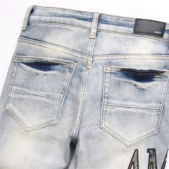 #M48 P168💰 Amiri classic embroidered patched leather distressed lettered jeans, slim fit jeans, produced by a major washed factory, full of high-end feel, partially destroyed knee design with leather patchwork design, has been used as a facade design, leather waist nameplate, the focus of this style is not on the washing, but on the destroyed shape and version. The secret lies in the craftsmanship of the master. The cost of post-processing, grinding, cutting, etc. is far beyond the cost of assembly line products. Color: Picture color Size: 30-32-34-36