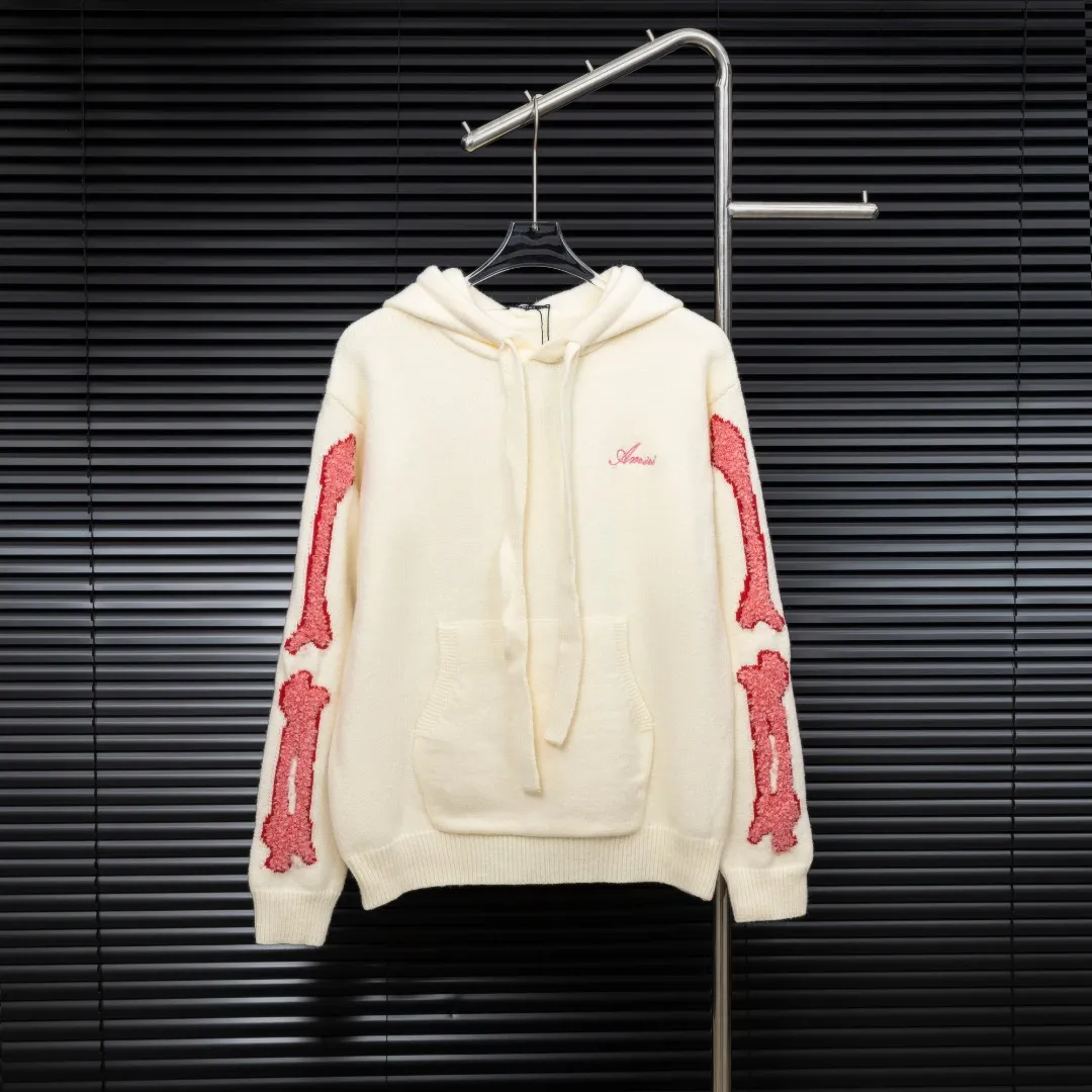 P360 Style: AMIRI Emile bone splicing hooded long-sleeved sweater Size: S-XXL Fabric: Wool blend Accessories: Full set of customized original accessories No gender distinction, same style for men and women