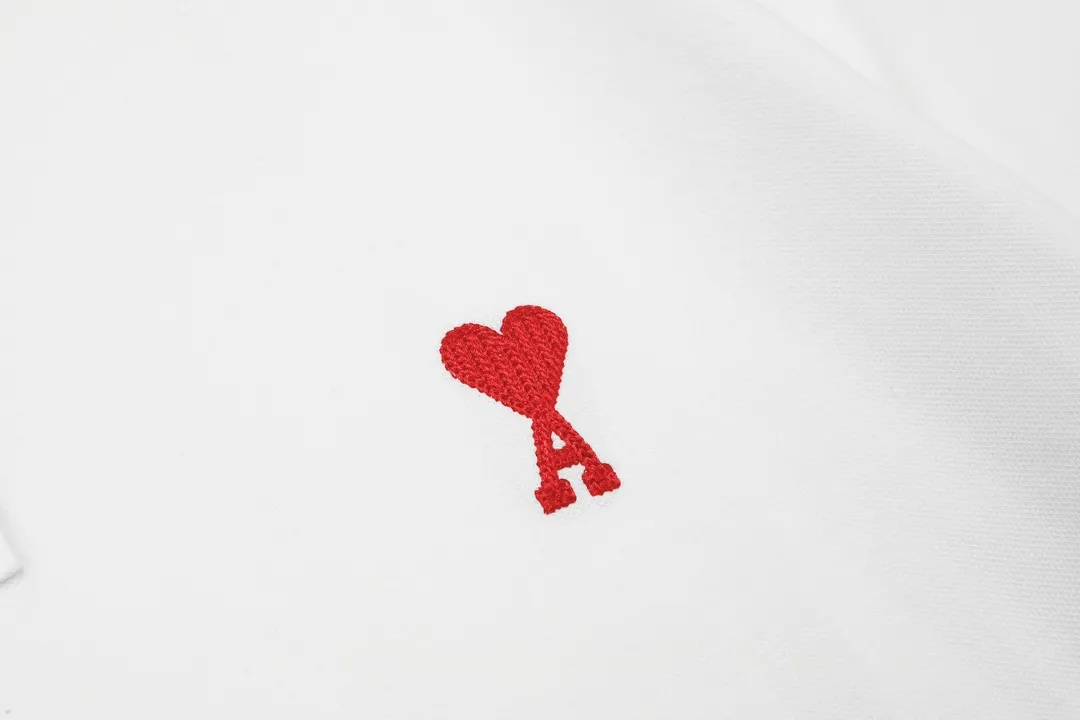 🅿️190 ami 2025 new love embroidered logo couple style casual polo shirt ·Customized pique cotton fabric ·Imported Tajima machine embroidery technology ·Collar label, hangtag, main mark and three labels complete Color: White Size: M-XXXL