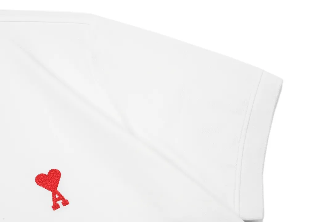 🅿️190 ami 2025 new love embroidered logo couple style casual polo shirt ·Customized pique cotton fabric ·Imported Tajima machine embroidery technology ·Collar label, hangtag, main mark and three labels complete Color: White Size: M-XXXL