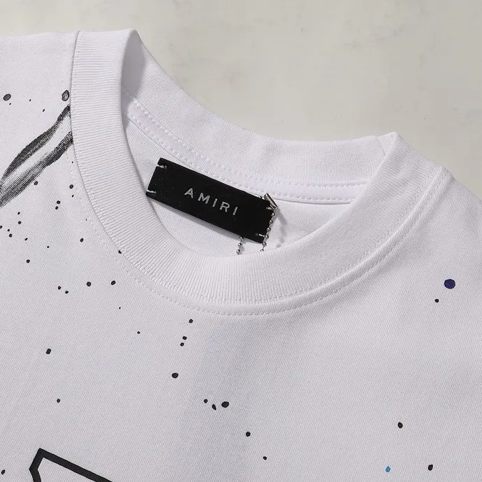 Style number: 714 P126 Fabric: 260g double yarn AMIRI 2025 spring and summer new logo round neck T-shirt high street men and women loose classic letter splash black short sleeves Color: black. White Size: S M L XL