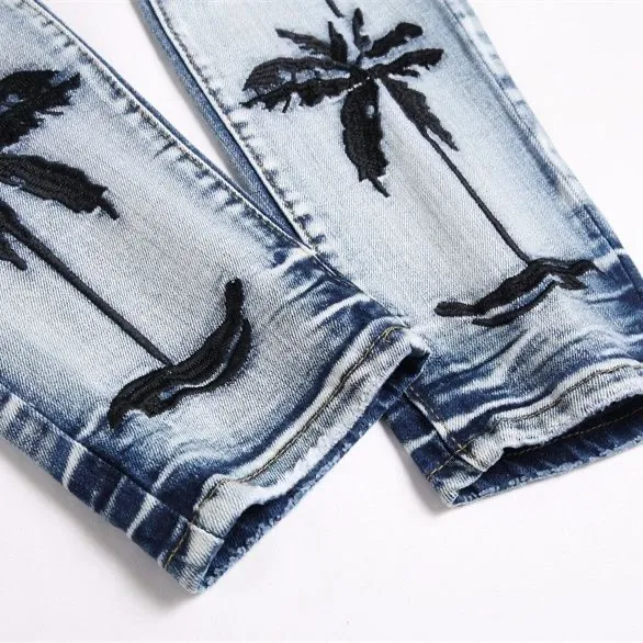 #M52 P168💰 Independent AMIRI coconut tree embroidery jeans trousers AMIRI high street basic ripped tight elastic jeans trousers amiri brand jeans break the production process and cutting of the original jeans, the fabrics are softer and more comfortable Hand-sewn collar label Customized logo buttons Genuine leather tag Color: light blue Size: 30-32-34-36