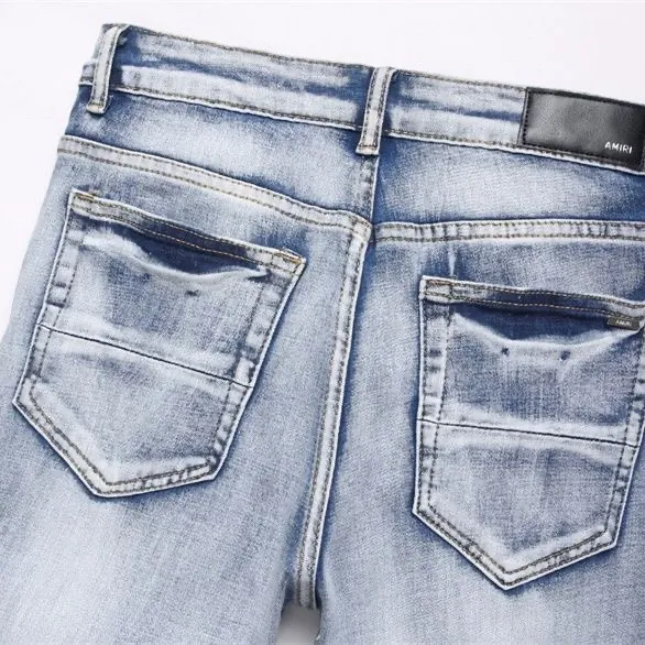 P186 💰 AMIRI patch embroidery jeans trousers AMIRI high street basic ripped tight elastic jeans trousers amiri brand jeans break the production process and cutting of the original jeans, the fabrics are softer and more comfortable Hand-sewn collar label Customized logo buttons Genuine leather tag Color: Picture color Size: 30-32-34-36