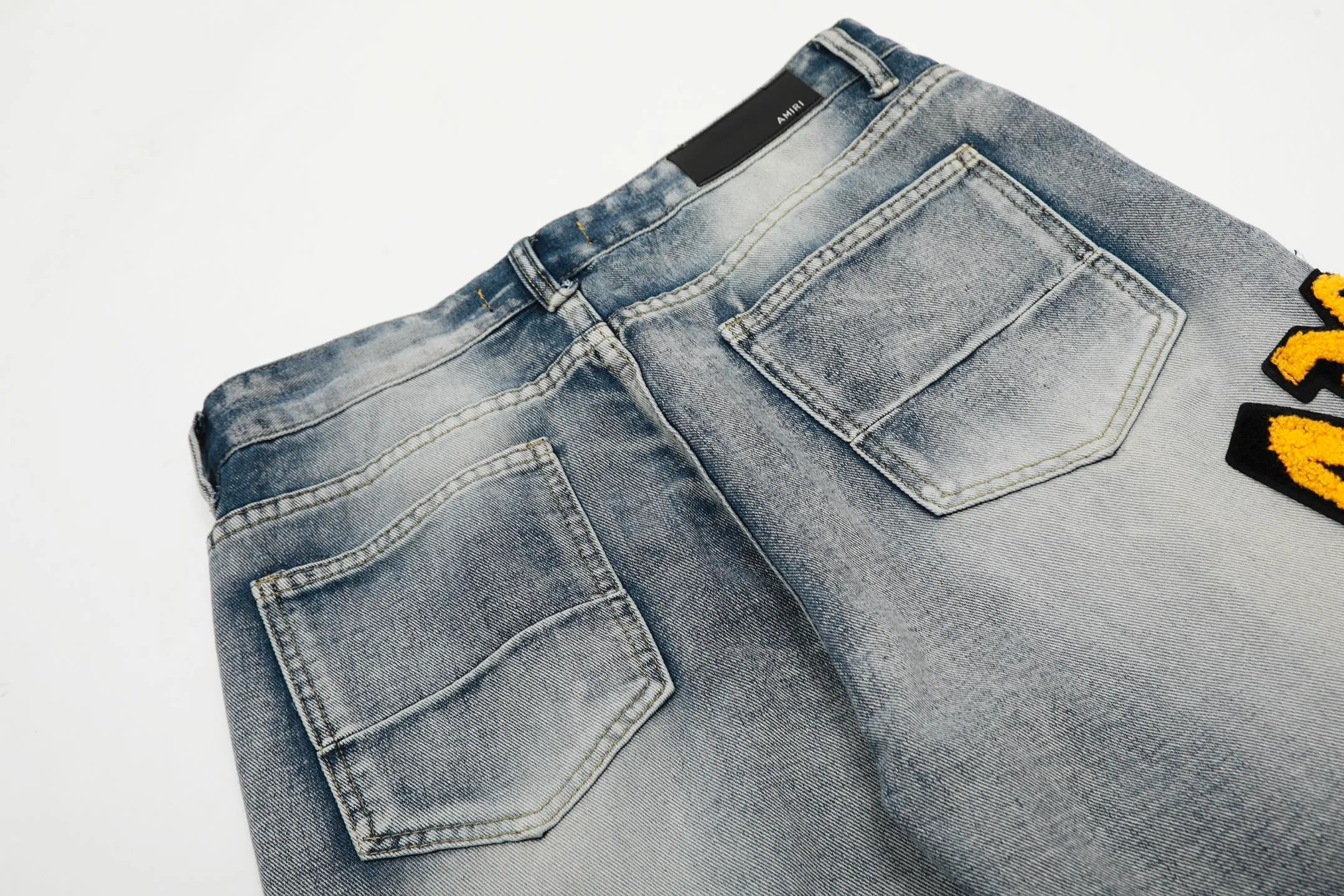 #M14 P168💰 Heavyweight AMIRI 24ss embroidery wings high street jeans slim fit stretch washed knife cut hole trousers FOG high street men's trend AMIRI amiri is transliterated as Emil, which is the name of the founder. Mike Amiri, the founder of amiri, grew up in Los Angeles, USA, and was influenced by local street culture and Punk Rock since he was a child. Due to his influence, he founded the amiri brand named after himself. A variety of trendy clothing meets the needs of different fashion players. Amiri clothing has novel and unique styles and is a well-known street brand in the United States. The styles and styles of many clothes are loved by many street photographers. The various clothing styles meet the dressing needs of different people, show their unique temperament, and show the trend of dressing. amiri's jeans are relatively famous. Not only do they have many styles, but the quality of the jeans is also very good. Many celebrities have also worn amiri brand jeans. Color: Picture color Size: 30-32-34-36