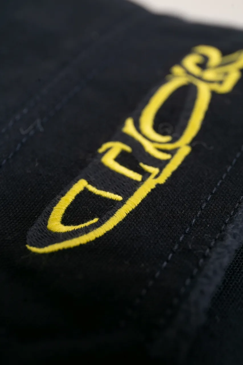DIOR AND LEWIS HAMILTON Navy blue cotton denim overshirt This overshirt is from the DIOR AND LEWIS HAMILTON limited collection. Crafted from navy blue cotton denim, it features contrasting DIOR AND LEWIS HAMILTON embroidery on the chest and back, a graphic design highlighting Dior's iconic signature. Wear it with the matching jeans for a comfortable, oversized fit. Contrasting DIOR AND LEWIS HAMILTON embroidery on chest and back Button closure and cuffs Chest flap pocket 100% cotton