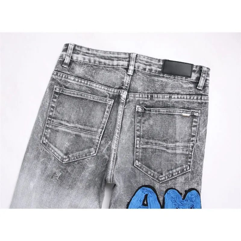 P186 💰 AMIRI patch embroidery jeans trousers AMIRI high street basic ripped tight elastic jeans trousers amiri brand jeans break the production process and cutting of the original jeans, the fabrics are softer and more comfortable Hand-sewn collar label Customized logo buttons Genuine leather tag Color: Picture color Size: 30-32-34-36