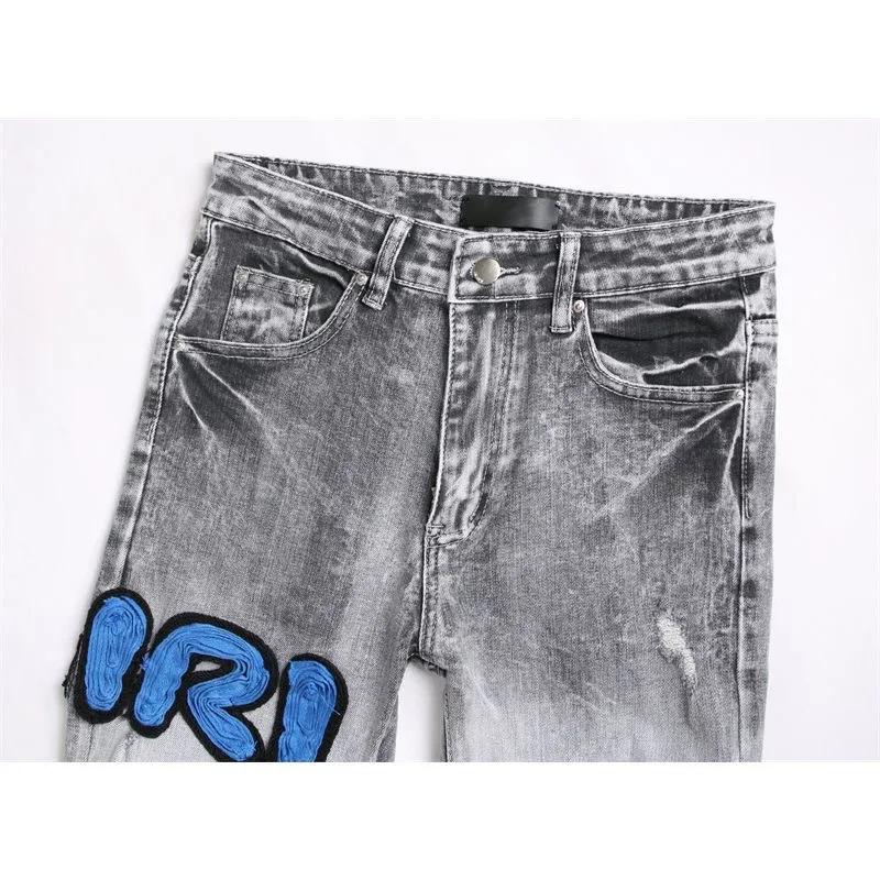 P186 💰 AMIRI patch embroidery jeans trousers AMIRI high street basic ripped tight elastic jeans trousers amiri brand jeans break the production process and cutting of the original jeans, the fabrics are softer and more comfortable Hand-sewn collar label Customized logo buttons Genuine leather tag Color: Picture color Size: 30-32-34-36