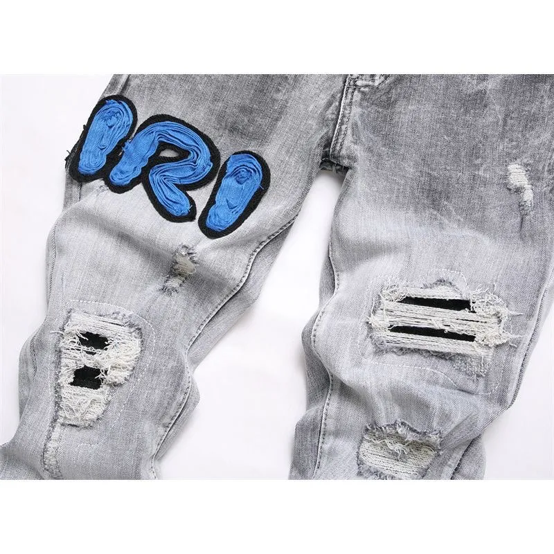 P186 💰 AMIRI patch embroidery jeans trousers AMIRI high street basic ripped tight elastic jeans trousers amiri brand jeans break the production process and cutting of the original jeans, the fabrics are softer and more comfortable Hand-sewn collar label Customized logo buttons Genuine leather tag Color: Picture color Size: 30-32-34-36