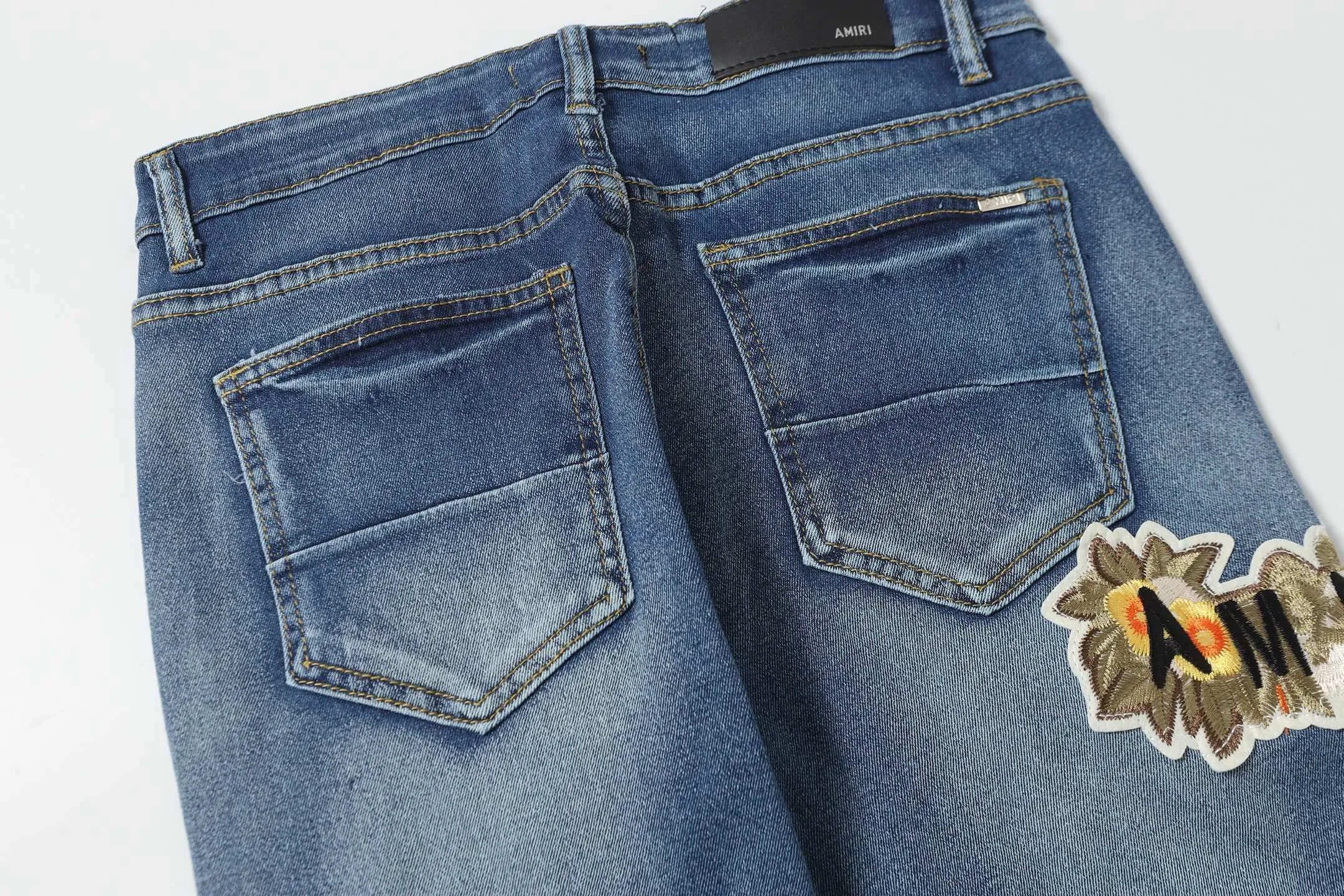 P270 AMIRI patch embroidery jeans trousers AMIRI high street basic ripped jeans trousers Color: Picture color Code number: 28-36