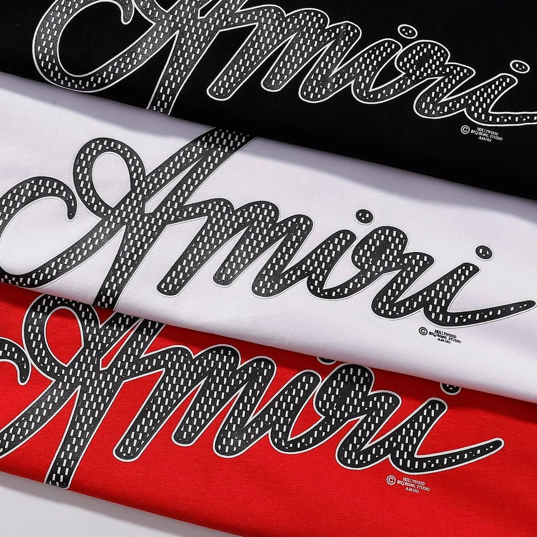 P114 Fabric: 260g double yarn AMIRI 2025 spring and summer new logo round neck T-shirt high street same style for men and women loose classic letter printed short sleeves Color: black. White Red Size: S M L XL
