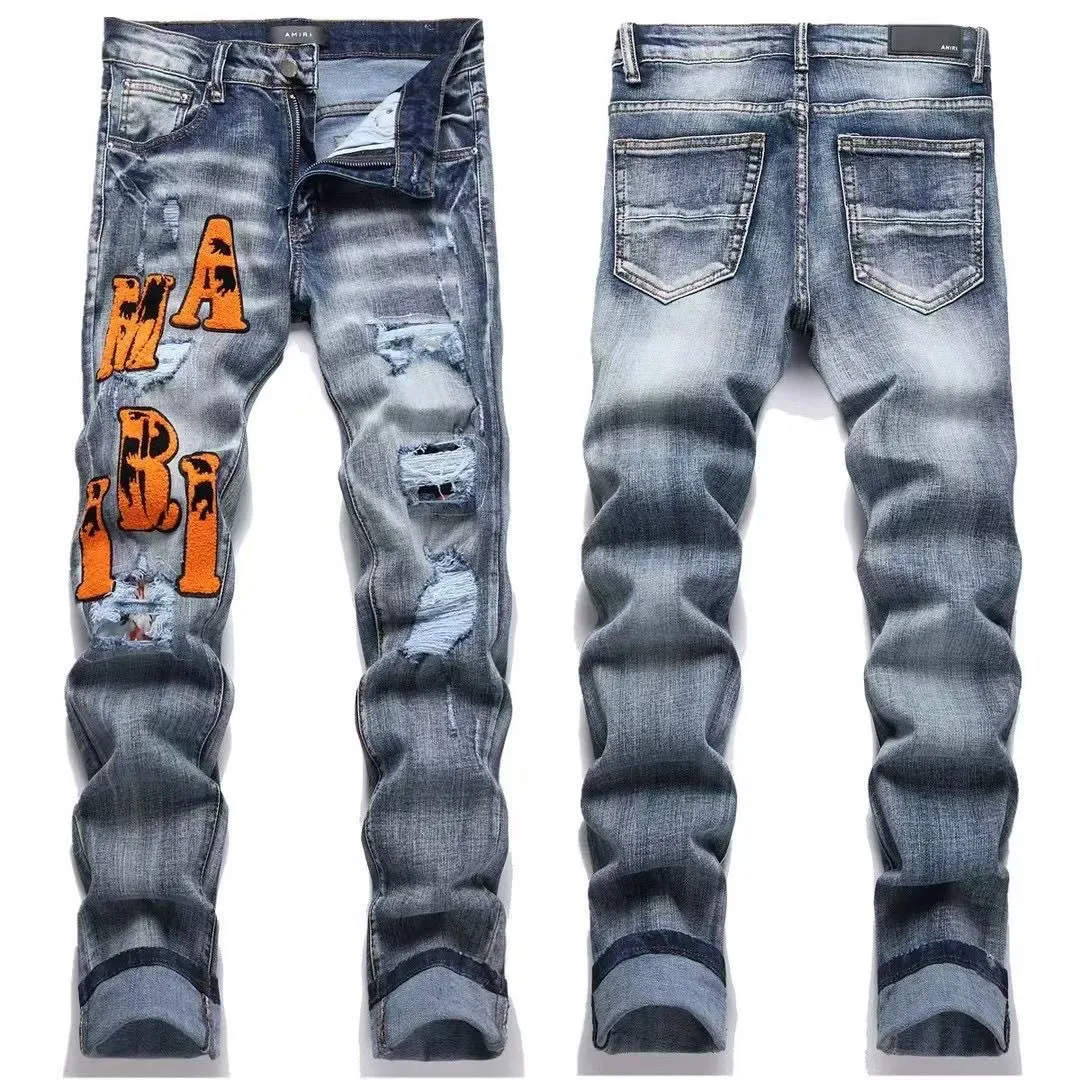 P168 💰 AMIRI patch embroidery jeans trousers AMIRI high street basic ripped tight elastic jeans trousers amiri brand jeans break the production process and cutting of the original jeans, the fabrics are softer and more comfortable Hand-sewn collar label Customized logo buttons Genuine leather tag Color: Picture color Size: 30-32-34-36