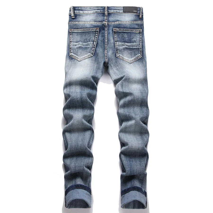P168 💰 AMIRI patch embroidery jeans trousers AMIRI high street basic ripped tight elastic jeans trousers amiri brand jeans break the production process and cutting of the original jeans, the fabrics are softer and more comfortable Hand-sewn collar label Customized logo buttons Genuine leather tag Color: Picture color Size: 30-32-34-36
