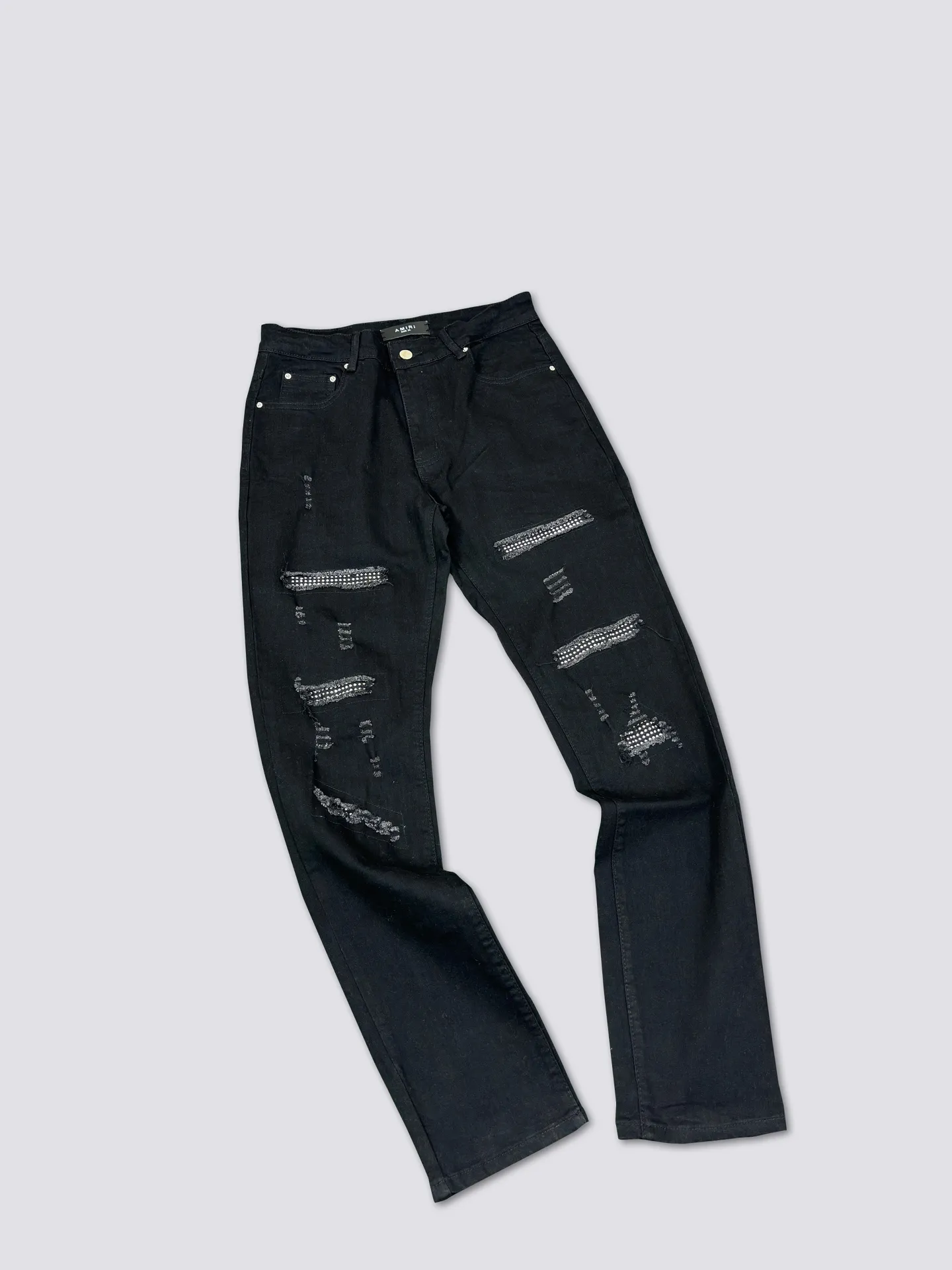 AMIRI's new jeans are washed and splashed with ink, ripped holes and silver diamond denim trousers, the same style for men and women. Color: black. Size: S-XL (28-34)