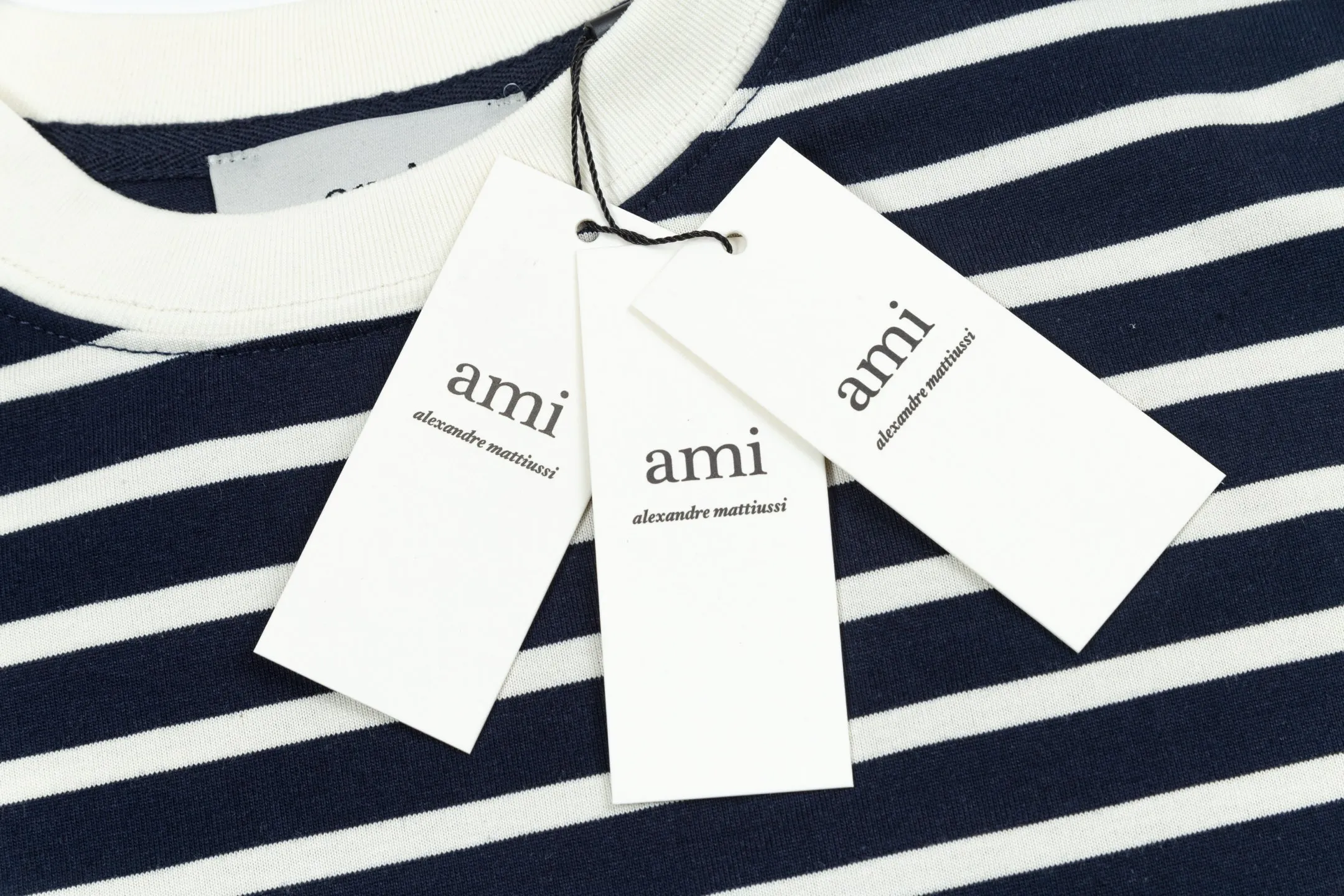 1231# AMI PARIS 25SS new letter LOGO small label striped loose and versatile casual three-quarter sleeve short-sleeved T-shirt logo round neck 240g pure cotton fabric loose short style Color: Orchidma Apricot S-XL