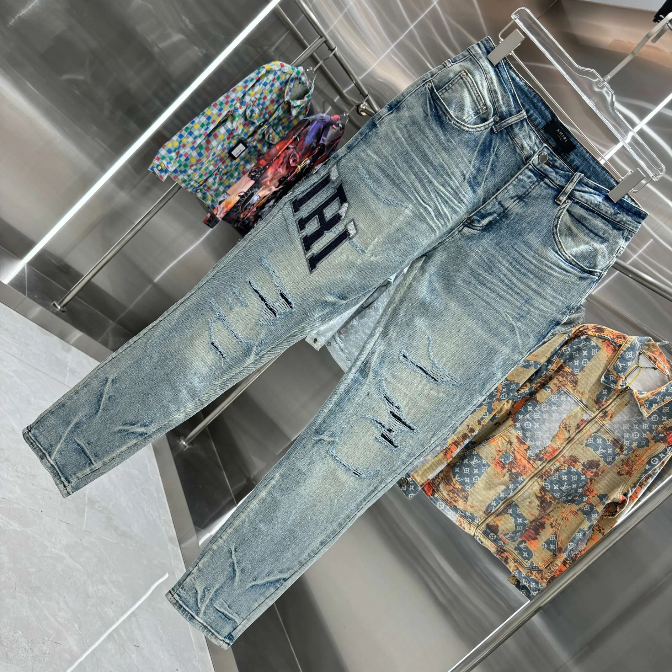 P290 Amiri ripped letter embroidery craft street fashion slim fit stretch jeans color blue size 30 32 34 36 38