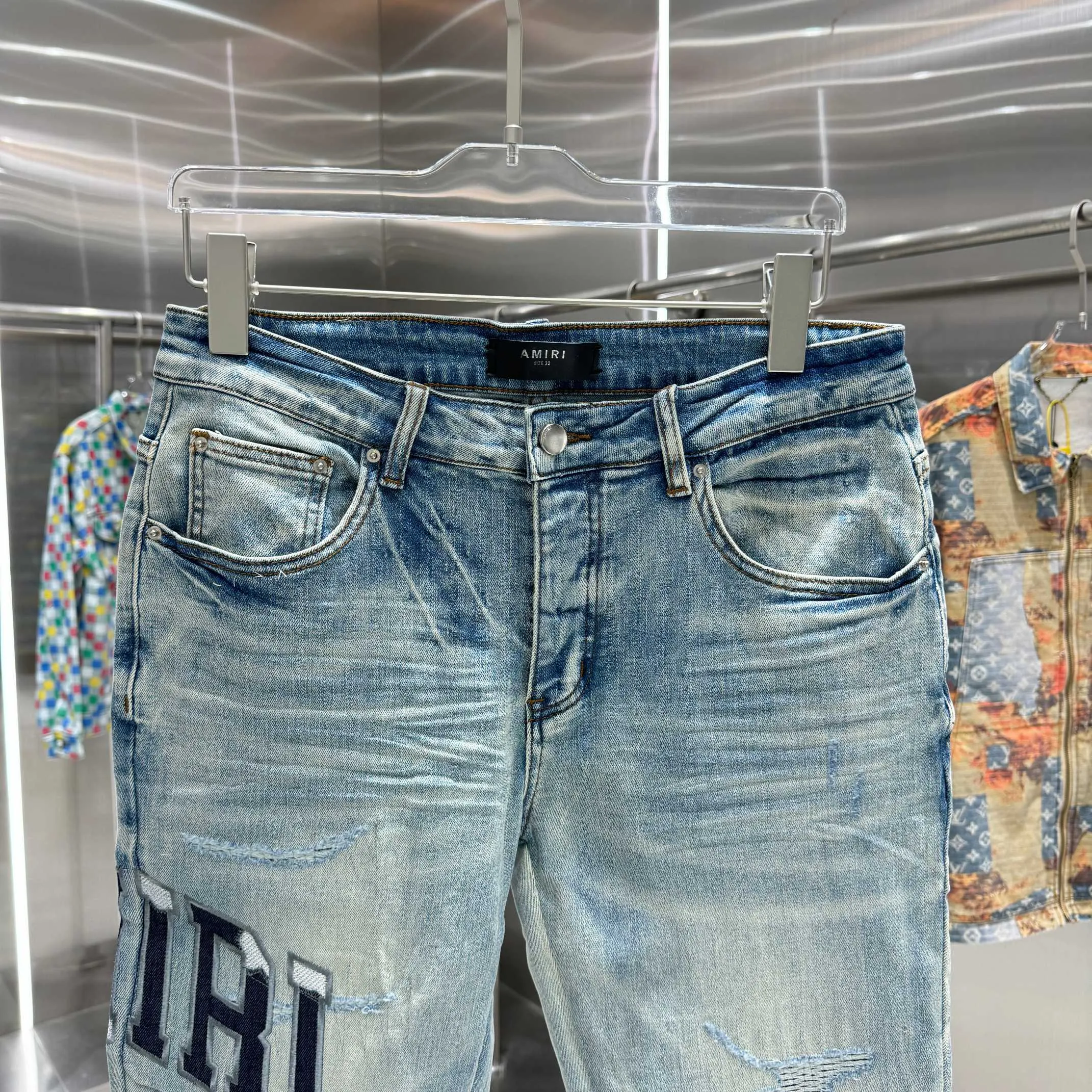 P290 Amiri ripped letter embroidery craft street fashion slim fit stretch jeans color blue size 30 32 34 36 38