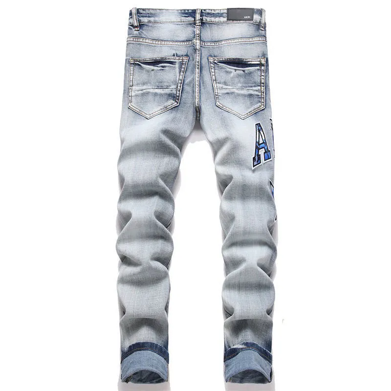 P186 Top replica AMIRI splash-ink medal patch embroidered jeans trousers AMIRI high street basic ripped tight stretch jeans trousers Amiriamiri is transliterated as Emil, which is the name of the founder. Mike Amiri, the founder of amiri, grew up in Los Angeles, USA. He was influenced by the local street culture Rock since childhood, so he founded the amiri brand named after himself. A variety of trendy clothing meets the needs of different fashion players. Amiri clothing has novel and unique styles and is a well-known street brand in the United States. Many of its styles and styles are loved by many street photographers. Various clothing styles meet the needs of different people, show their unique temperament, and show the trend of dressing. amiri's jeans are relatively famous. Not only do they have many styles, but the quality of the jeans is also very good. Many celebrities have also worn amiri brand jeans.  The jeans of the amiri brand break through the production process and cutting of the original jeans. The fabrics are relatively soft and comfortable, and are not as hard as some jeans, which can irritate the skin and cause the skin to bleed when worn. Los Angeles trendy brand Amiri's jeans are made with great detail from tailoring to texture, adding wrinkles, bullet holes, damage and other details to add to the trendiness of the jeans. You can choose the style that suits you according to your own needs. Only when you wear a suitable style can you have a certain sense of fashion.  In recent years, high street has become a word that appears more and more frequently in men's clothing. High street style has also become an important direction for everyone's matching. High street related items are basically inseparable from oversize or off-shoulder tops. The lower body is matched with trackpants or tight-fitting denim. In my opinion, the most representative one is perhaps annihilation. Color; picture color Size: m l xl xxl