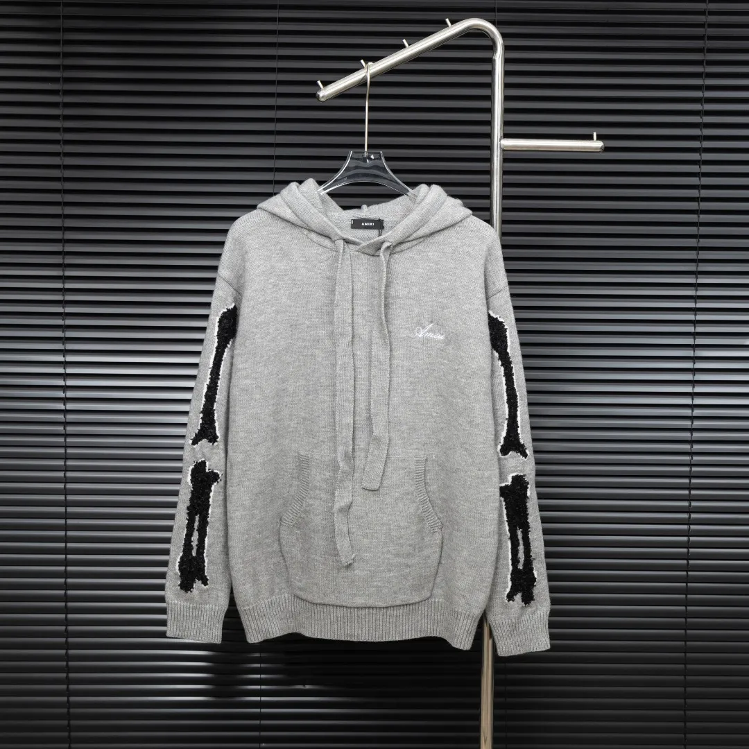 P360 Style: AMIRI Emile bone splicing hooded long-sleeved sweater Size: S-XXL Fabric: Wool blend Accessories: Full set of customized original accessories No gender distinction, same style for men and women