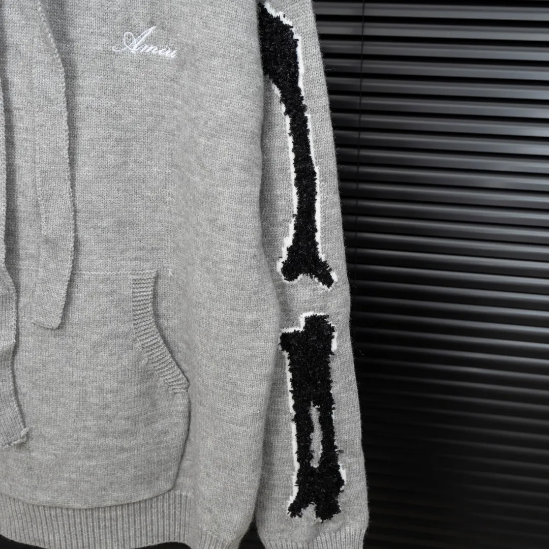 P360 Style: AMIRI Emile bone splicing hooded long-sleeved sweater Size: S-XXL Fabric: Wool blend Accessories: Full set of customized original accessories No gender distinction, same style for men and women