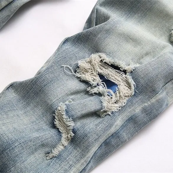 P186 Top replica AMIRI splash-ink medal patch embroidered jeans trousers AMIRI high street basic ripped tight stretch jeans trousers Amiriamiri is transliterated as Emil, which is the name of the founder. Mike Amiri, the founder of amiri, grew up in Los Angeles, USA. He was influenced by the local street culture Rock since childhood, so he founded the amiri brand named after himself. A variety of trendy brand clothing meets the needs of different fashion players. Amiri clothing has novel and unique styles and is a well-known street brand in the United States. Many of its styles and styles are loved by many street photographers. Various clothing styles meet the needs of different people, show their unique temperament, and show the trend of dressing. amiri's jeans are relatively famous. Not only do they have many styles, but the quality of the jeans is also very good. Many celebrities have also worn amiri brand jeans.  The jeans of the amiri brand break through the production process and cutting of the original jeans. The fabrics are relatively soft and comfortable, and are not as hard as some jeans, which can irritate the skin and cause the skin to bleed when worn. Los Angeles trendy brand Amiri's jeans are made with great detail from tailoring to texture, adding wrinkles, bullet holes, damage and other details to add to the trendiness of the jeans. You can choose the style that suits you according to your own needs. Only when you wear a suitable style can you have a certain sense of fashion.  In recent years, high street has become a word that appears more and more frequently in men's clothing. High street style has also become an important direction for everyone's matching. High street related items are basically inseparable from oversize or off-shoulder tops. The lower body is matched with trackpants or tight-fitting denim. In my opinion, the most representative one is perhaps annihilation. Color; picture color Size: m l xl xxl