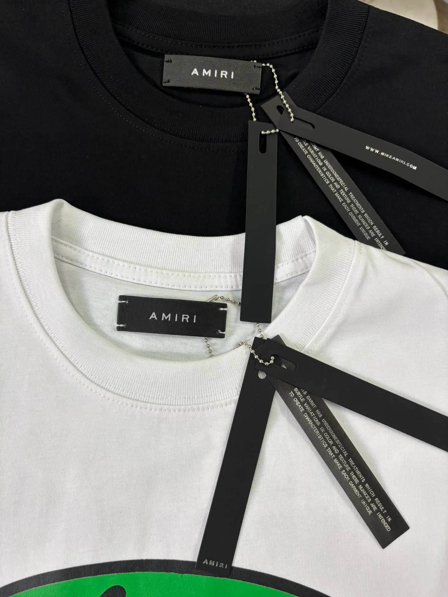 729 model P114 AMIRI real shot black white hanging shot S. M. L. XL