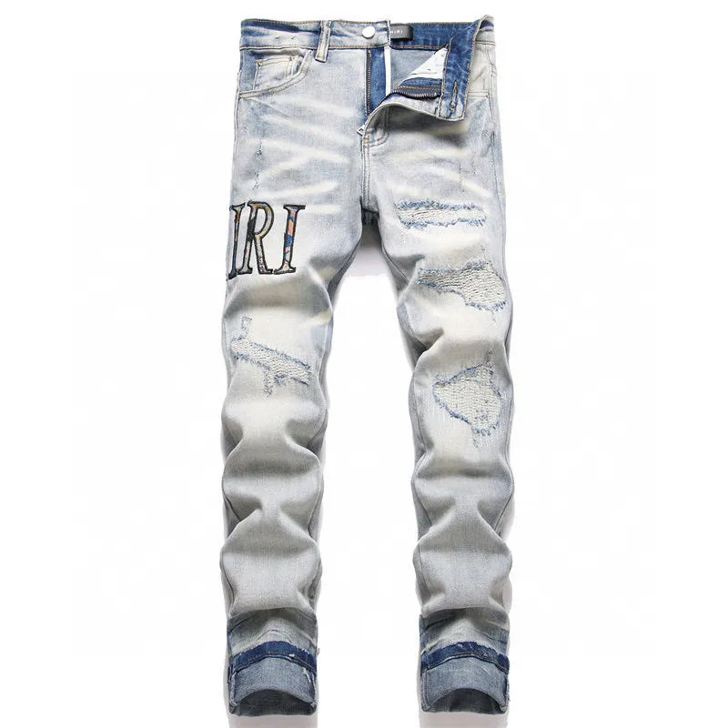 P180 Top replica AMIRI splash-ink medal patch embroidered jeans trousers AMIRI high street basic ripped tight stretch jeans trousers Amiriamiri is transliterated as Emil, which is the name of the founder. Mike Amiri, the founder of amiri, grew up in Los Angeles, USA. He was influenced by the local street culture Rock since he was a child, so he founded the amiri brand named after himself. A variety of trendy brand clothing meets the needs of different fashion players. Amiri clothing has novel and unique styles and is a well-known street brand in the United States. Many of its styles and styles are loved by many street photographers. Various clothing styles meet the needs of different people, show their unique temperament, and show the trend of dressing. amiri's jeans are relatively famous. Not only do they have many styles, but the quality of the jeans is also very good. Many celebrities have also worn amiri brand jeans.  The jeans of the amiri brand break through the production process and cutting of the original jeans. The fabrics are relatively soft and comfortable, and are not as hard as some jeans, which can irritate the skin and cause the skin to bleed when worn. Los Angeles trendy brand Amiri's jeans are made with great detail from tailoring to texture, adding wrinkles, bullet holes, damage and other details to add to the trendiness of the jeans. You can choose the style that suits you according to your own needs. Only when you wear a suitable style can you have a certain sense of fashion.  In recent years, high street has become a word that appears more and more frequently in men's clothing. High street style has also become an important direction for everyone's matching. High street related items are basically inseparable from oversize or off-shoulder tops. The lower body is matched with trackpants or tight-fitting denim. In my opinion, the most representative one is perhaps annihilation. Color; picture color Size: m l xl xxl