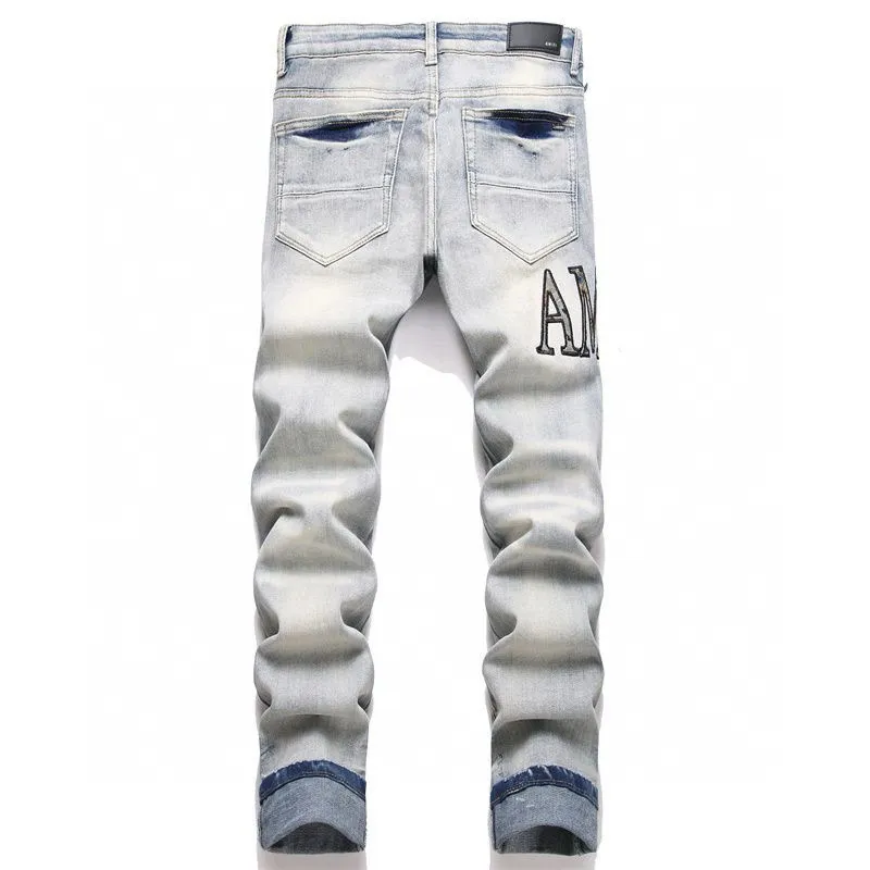 P180 Top replica AMIRI splash-ink medal patch embroidered jeans trousers AMIRI high street basic ripped tight stretch jeans trousers Amiriamiri is transliterated as Emil, which is the name of the founder. Mike Amiri, the founder of amiri, grew up in Los Angeles, USA. He was influenced by the local street culture Rock since he was a child, so he founded the amiri brand named after himself. A variety of trendy brand clothing meets the needs of different fashion players. Amiri clothing has novel and unique styles and is a well-known street brand in the United States. Many of its styles and styles are loved by many street photographers. Various clothing styles meet the needs of different people, show their unique temperament, and show the trend of dressing. amiri's jeans are relatively famous. Not only do they have many styles, but the quality of the jeans is also very good. Many celebrities have also worn amiri brand jeans.  The jeans of the amiri brand break through the production process and cutting of the original jeans. The fabrics are relatively soft and comfortable, and are not as hard as some jeans, which can irritate the skin and cause the skin to bleed when worn. Los Angeles trendy brand Amiri's jeans are made with great detail from tailoring to texture, adding wrinkles, bullet holes, damage and other details to add to the trendiness of the jeans. You can choose the style that suits you according to your own needs. Only when you wear a suitable style can you have a certain sense of fashion.  In recent years, high street has become a word that appears more and more frequently in men's clothing. High street style has also become an important direction for everyone's matching. High street related items are basically inseparable from oversize or off-shoulder tops. The lower body is matched with trackpants or tight-fitting denim. In my opinion, the most representative one is perhaps annihilation. Color; picture color Size: m l xl xxl
