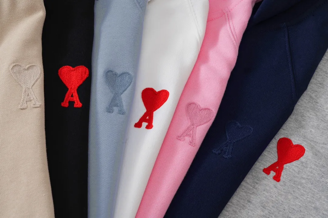 641# AMI Paris 2023 new product love towel embroidered raglan hooded cardigan sweatshirt. Customized 400g pure cotton fabric. Same style for men and women. Color: black, white, candy pink, sky blue, floral gray, vanilla apricot, orchid. Size: S-XL