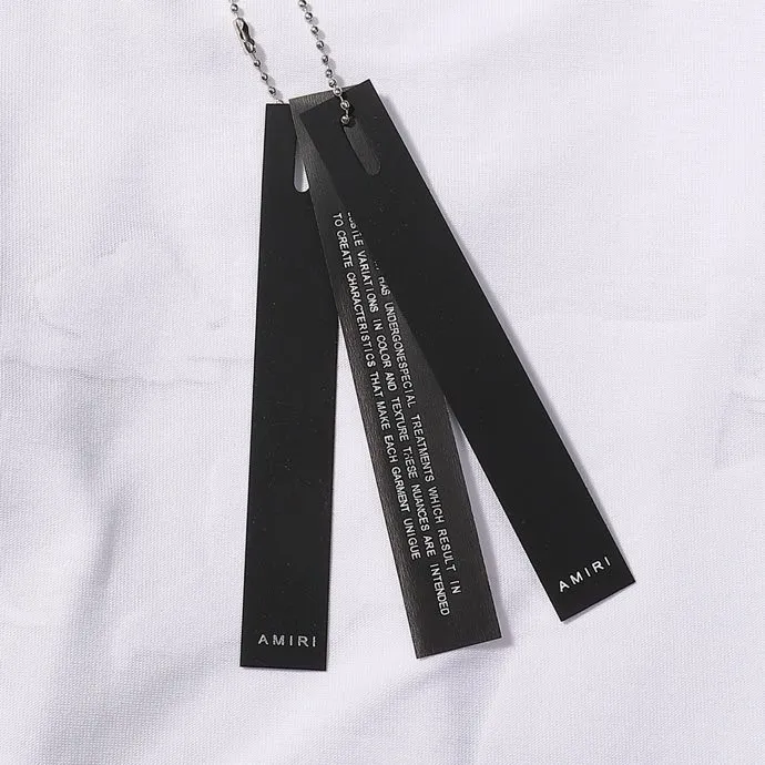 Style number: 724 P126 Fabric: 260g double yarn AMIRI 2025 spring and summer new logo round neck T-shirt high street men and women loose classic letter cashew flower short sleeves Color: black. White Size: S M L XL