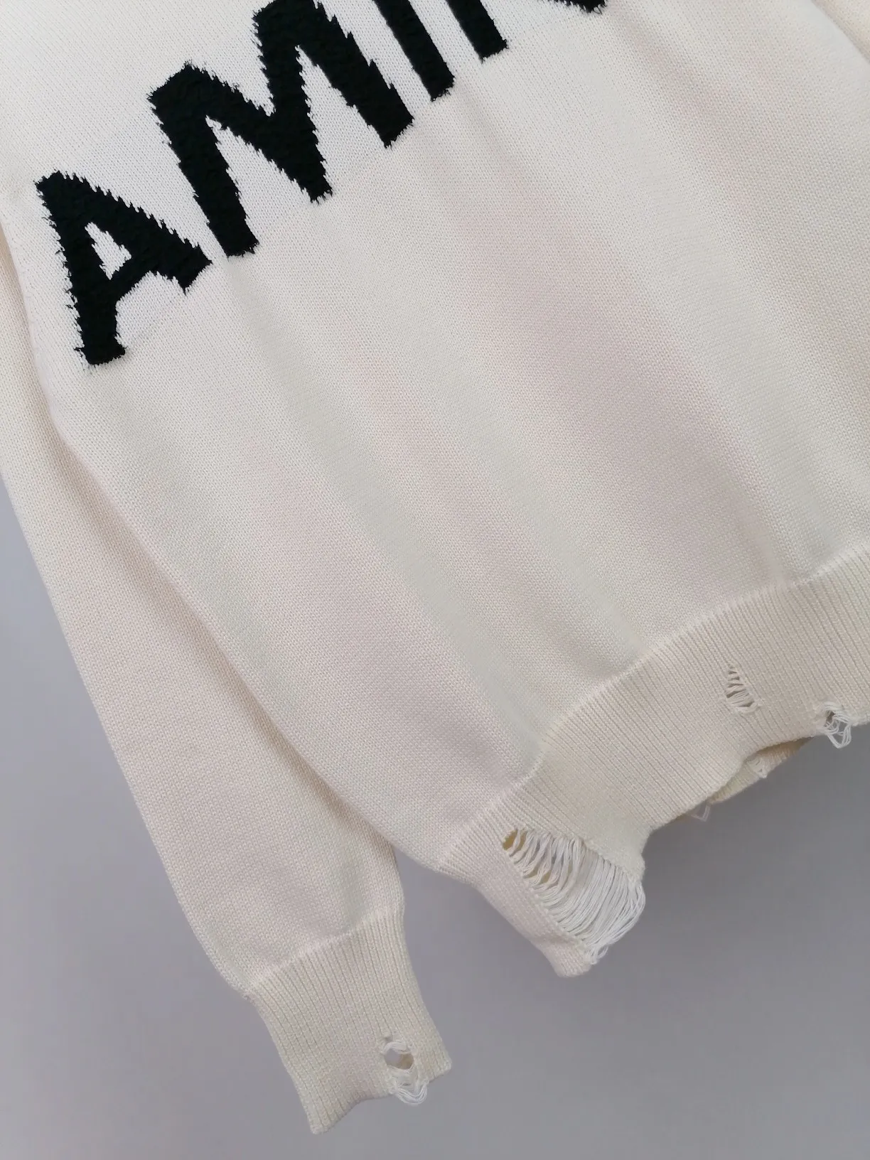 P230 🎉 AMIRI new style letter Logo jacquard, tassels destroyed holes European and American style sweater, color: pearl white, black size: S M L XL XXL