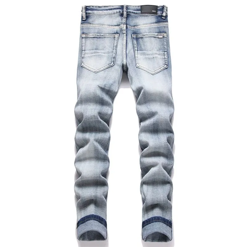 P180 Top replica AMIRI splash-ink medal patch embroidered jeans trousers AMIRI high street basic ripped tight stretch jeans trousers Amiriamiri is transliterated as Emil, which is the name of the founder. Mike Amiri, the founder of amiri, grew up in Los Angeles, USA. He was influenced by the local street culture Rock since he was a child, so he founded the amiri brand named after himself. A variety of trendy brand clothing meets the needs of different fashion players. Amiri clothing has novel and unique styles and is a well-known street brand in the United States. Many of its styles and styles are loved by many street photographers. Various clothing styles meet the needs of different people, show their unique temperament, and show the trend of dressing. amiri's jeans are relatively famous. Not only do they have many styles, but the quality of the jeans is also very good. Many celebrities have also worn amiri brand jeans.  The jeans of the amiri brand break through the production process and cutting of the original jeans. The fabrics are relatively soft and comfortable, and are not as hard as some jeans, which can irritate the skin and cause the skin to bleed when worn. Los Angeles trendy brand Amiri's jeans are made with great detail from tailoring to texture, adding wrinkles, bullet holes, damage and other details to add to the trendiness of the jeans. You can choose the style that suits you according to your own needs. Only when you wear a suitable style can you have a certain sense of fashion.  In recent years, high street has become a word that appears more and more frequently in men's clothing. High street style has also become an important direction for everyone's matching. High street related items are basically inseparable from oversize or off-shoulder tops. The lower body is matched with trackpants or tight-fitting denim. In my opinion, the most representative one is perhaps annihilation. Color; picture color Size: m l xl xxl