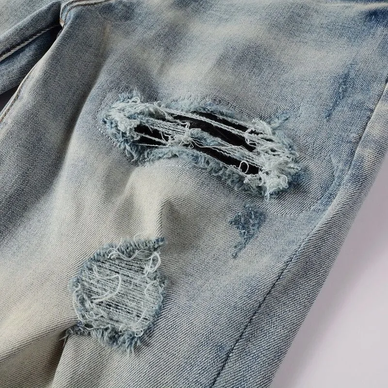 P166 Top replica AMIRI jeans trousers AMIRI high street basic ripped tight stretch jeans trousers Amiriamiri is transliterated as Emil, which is the name of the founder. Mike Amiri, the founder of amiri, grew up in Los Angeles, USA. He was influenced by the local street culture Rock since he was a child, so he founded the amiri brand named after himself. A variety of trendy clothing meets the needs of different fashion players. Amiri clothing has novel and unique styles and is a well-known street brand in the United States. Many of its styles and styles are loved by many street photographers. Various clothing styles meet the needs of different people, show their unique temperament, and show the trend of dressing. amiri's jeans are relatively famous. Not only do they have many styles, but the quality of the jeans is also very good. Many celebrities have also worn amiri brand jeans.  The jeans of the amiri brand break through the production process and cutting of the original jeans. The fabrics are relatively soft and comfortable, and are not as hard as some jeans, which can irritate the skin and cause the skin to bleed when worn. Los Angeles trendy brand Amiri's jeans are made with great detail from tailoring to texture, adding wrinkles, bullet holes, damage and other details to add to the trendiness of the jeans. You can choose the style that suits you according to your own needs. Only when you wear a suitable style can you have a certain sense of fashion.  In recent years, high street has become a word that appears more and more frequently in men's clothing. High street style has also become an important direction for everyone's matching. High street related items are basically inseparable from oversize or off-shoulder tops. The lower body is matched with trackpants or tight-fitting denim. In my opinion, the most representative one is perhaps annihilation. Color; picture color Size: m l xl xxl