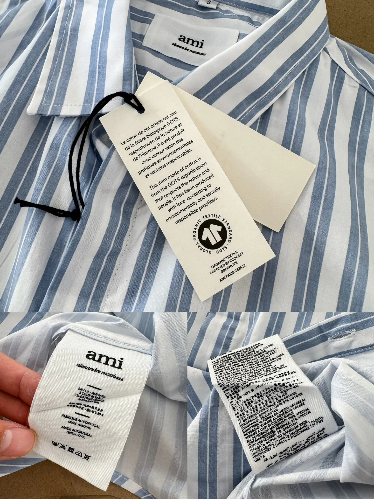 Ami Paris Oxford cotton button-down corner collar casual shirt-blue heart thick striped long-sleeved shirt-same style for men and women. Blue small love letter embroidery decoration fashionable and versatile long-sleeved shirt! On sale simultaneously at counters!  A well-known French affordable luxury fashion brand. The brand's classic elements are embellishments sought after by major celebrities. Its basic simple design and fashionable style make it a must-have couple's shirt for men and women!  Made of custom-woven 100% Oxford cloth pure cotton, it feels soft and delicate, has excellent moisture absorption and perspiration performance, and is very comfortable and skin-friendly when worn next to the skin! The chest of the shirt is decorated with the classic love letter A logo embroidery. The top-notch embroidery technology is tight, full and full of details, and is cleverly embellished with bright red. It carries all the eye-catching points. It follows the consistent minimalist French attitude. The fabric is soft and comfortable, suitable for any versatile casual shirt couple!  Color: Blue Stripe Size: S-XL S: Bust 106 Shoulder Width 47 Clothing Length 71 Sleeve Length 60 M: Bust 110 Shoulder Width 48 Clothing Length 73 Sleeve Length 61 L: Bust 114 Shoulder Width 49 Clothing Length 75 Sleeve Length 62