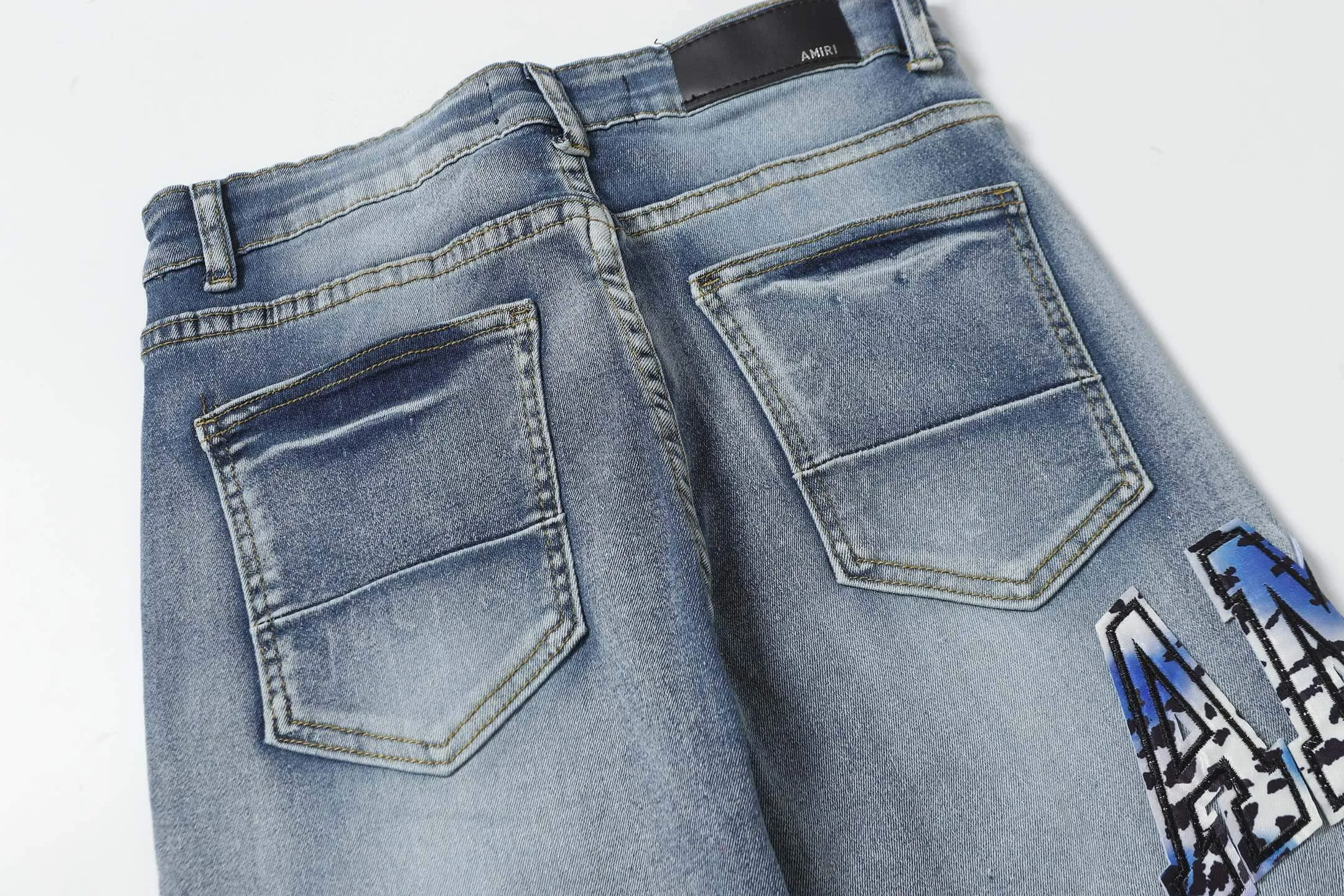 P270 AMIRI patch embroidery jeans trousers AMIRI high street basic ripped jeans trousers Color: Picture color Code number: 28-36