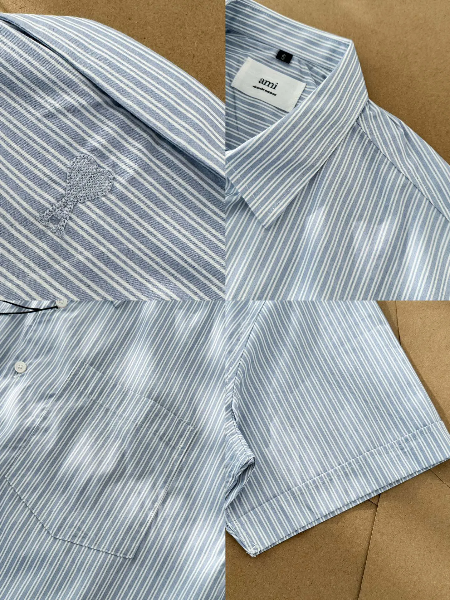 Ami Paris men's 24 spring and summer new love style loose cotton striped short shirt with the same color love at the back of the neck - the same style for men and women. The same color small love embroidery decoration at the back of the neck is fashionable and versatile long-sleeved shirt! On sale simultaneously at counters!  A well-known French affordable luxury fashion brand. The brand's classic elements are embellishments sought after by major celebrities. Its basic simple design and fashionable style make it a must-have couple's shirt for men and women!  Made of custom-woven 100% silk cotton material, it feels soft and delicate, has excellent moisture absorption and perspiration performance, and is very comfortable and skin-friendly when worn next to the skin! The simple and versatile pockets on the chest follow the consistent minimalist French attitude. The fabric is soft and comfortable, suitable for any versatile casual shirt couple!  Color: Blue Black Size: S-XL S: Bust 102, Shoulder 47, Length 70 M: Bust 106, Shoulder 48, Length 72 L: Bust 110, Shoulder 49, Length 74 XL: Bust 114, Shoulder 50, Length 76